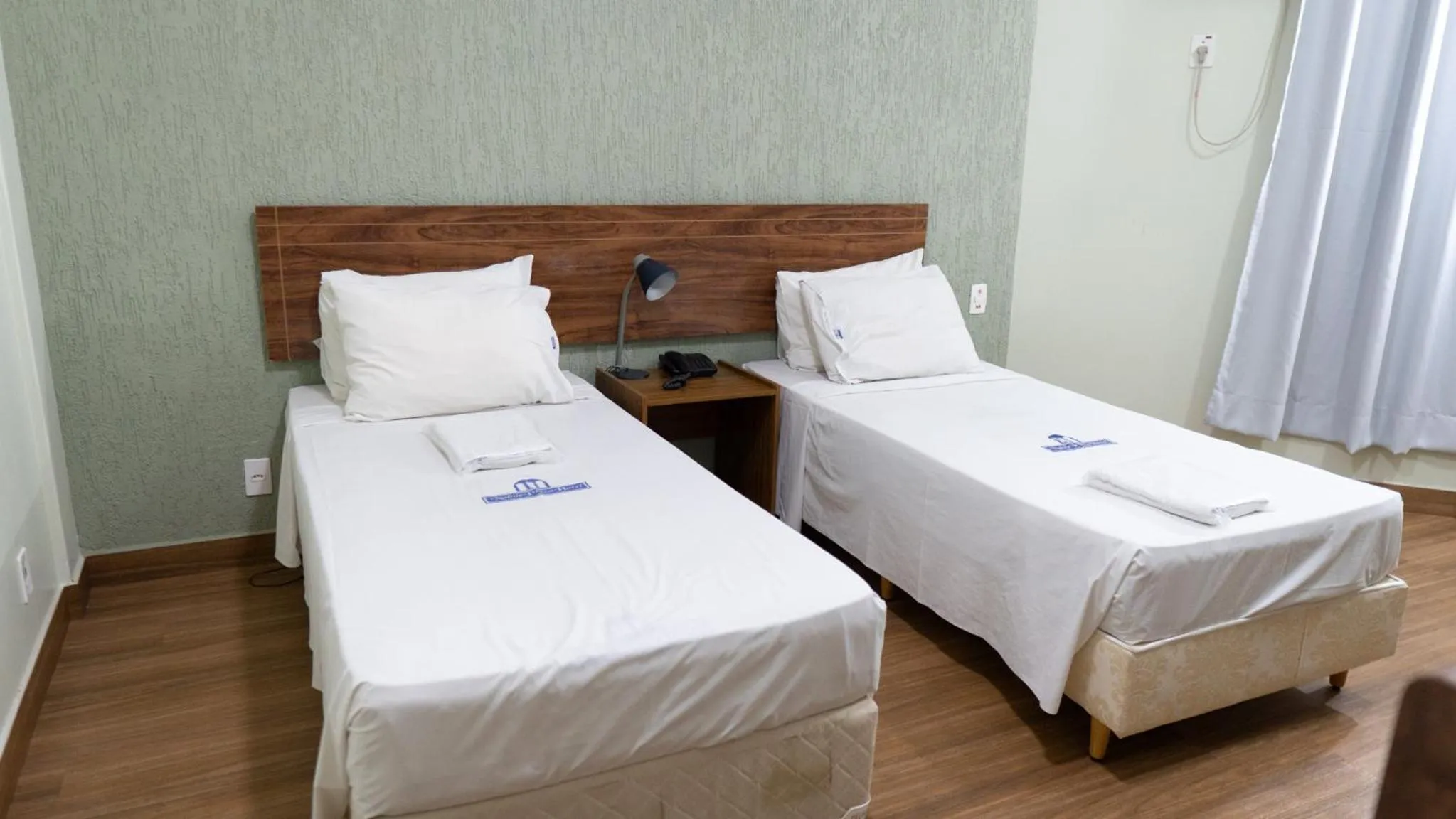 Bed in Nobile Plaza Hotel