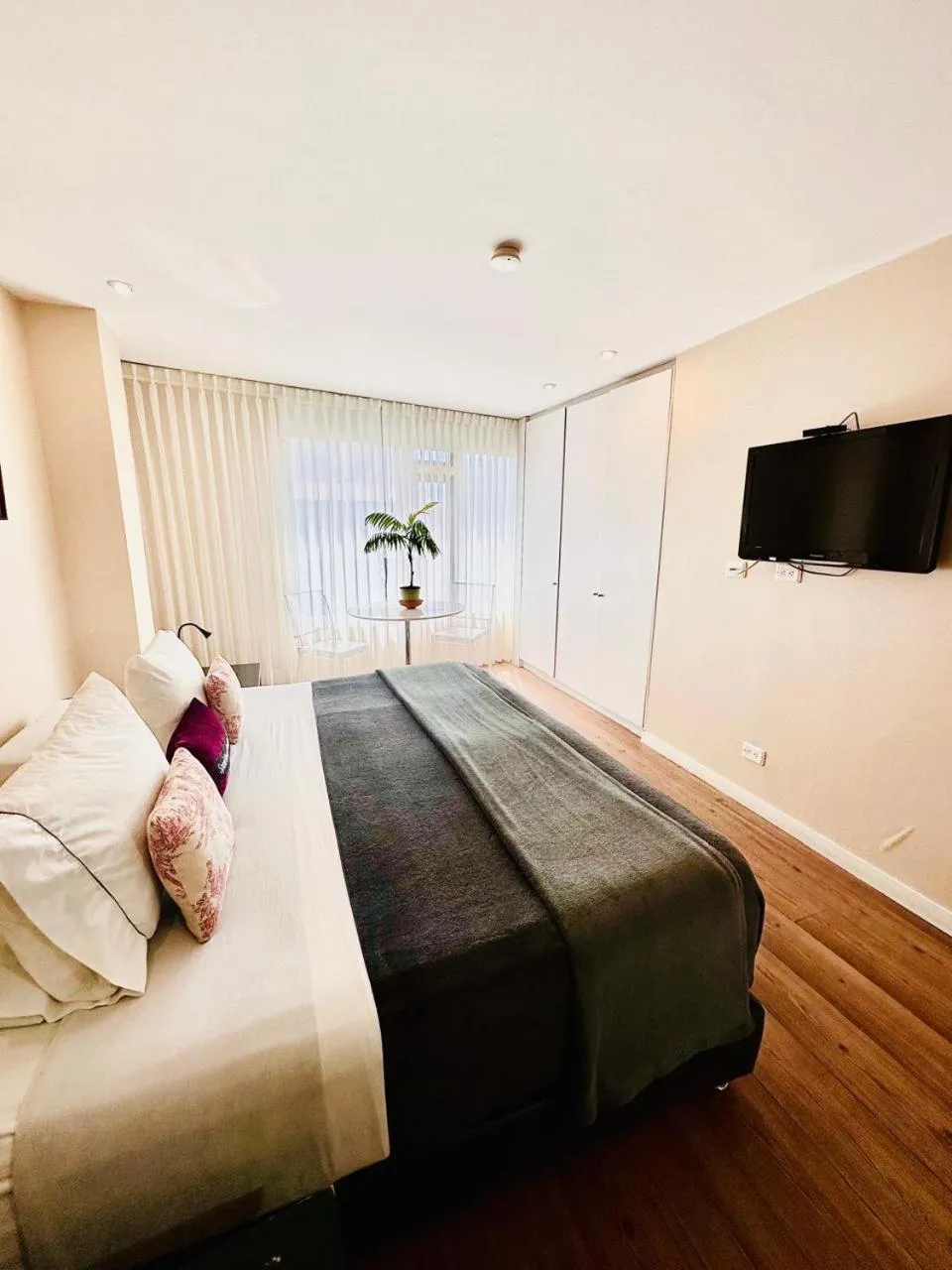 Bedroom, Bed in Hotel Living 55