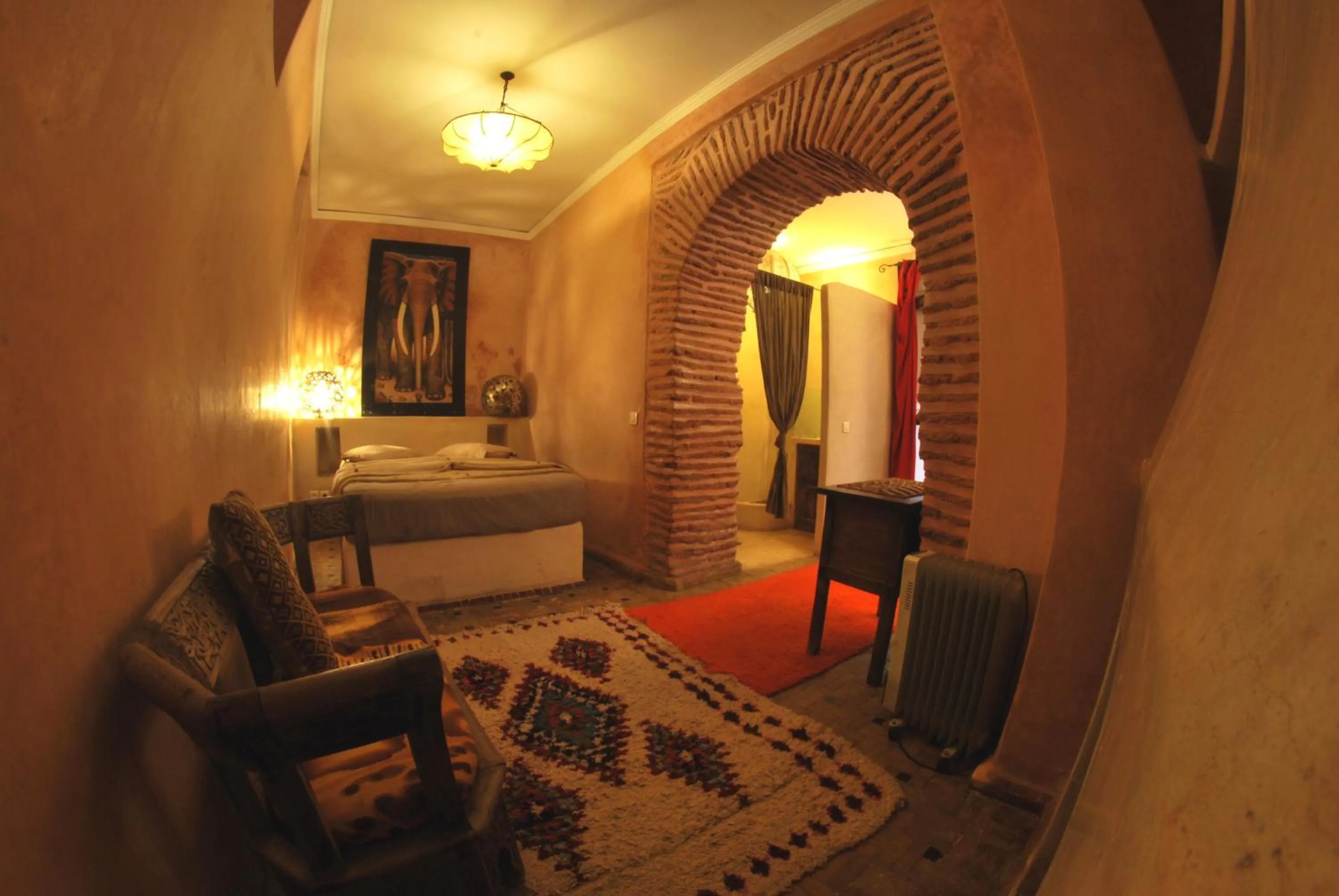 Bed in Riad Bamileke