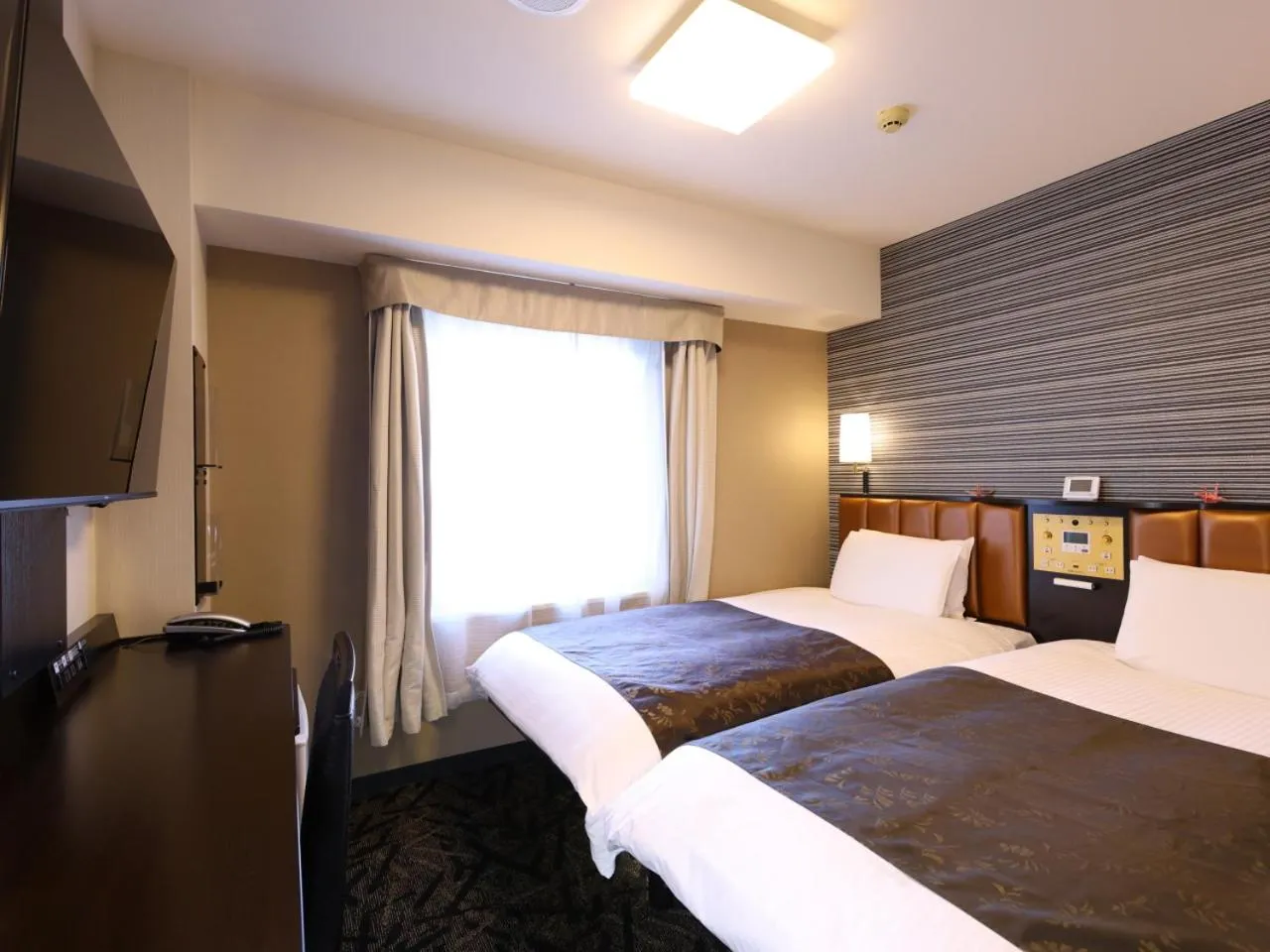 Photo of the whole room, Bed in APA Hotel Chiba Yachiyo Midorigaoka