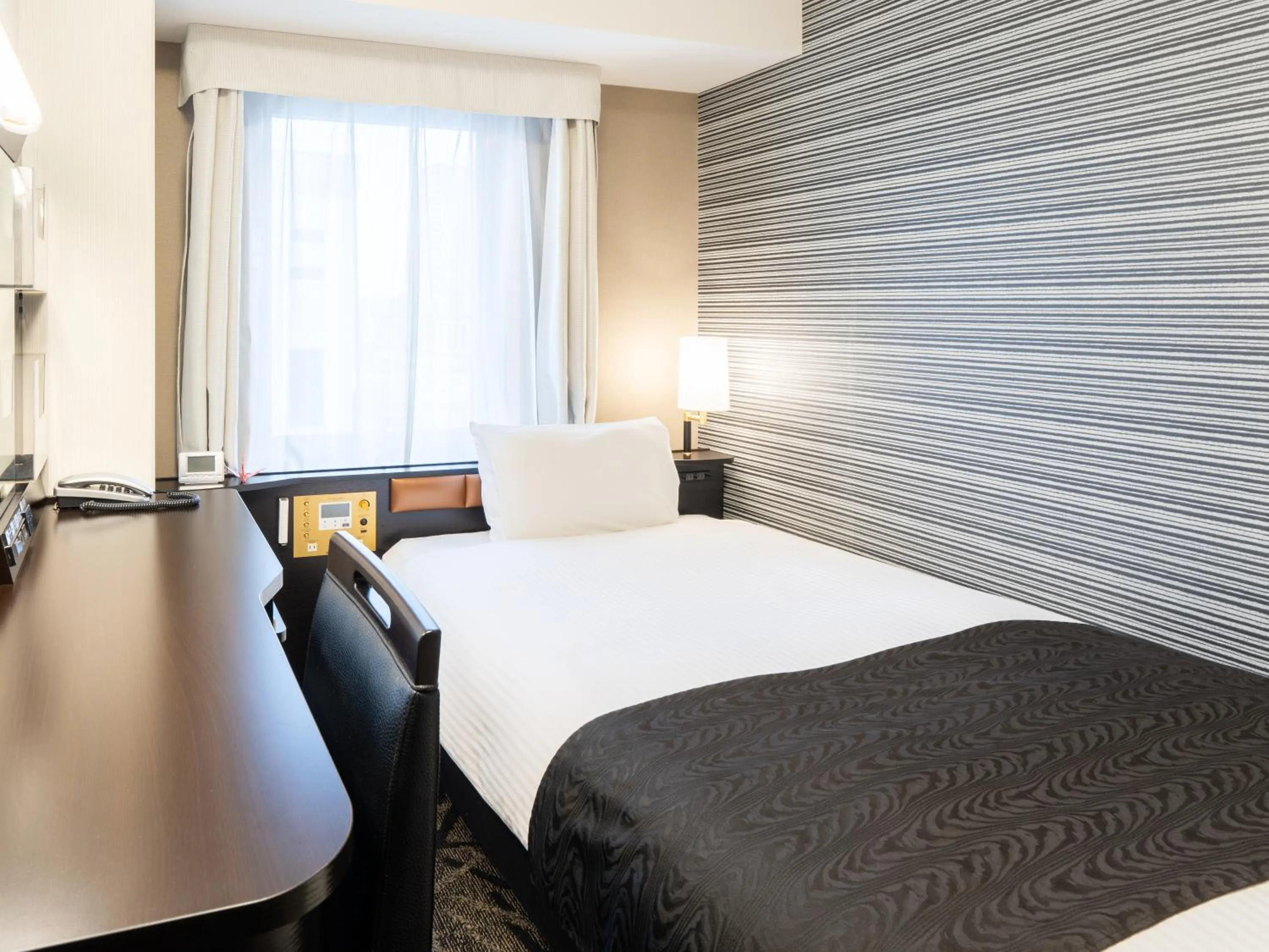 Photo of the whole room, Bed in APA Hotel Takasaki Ekimae