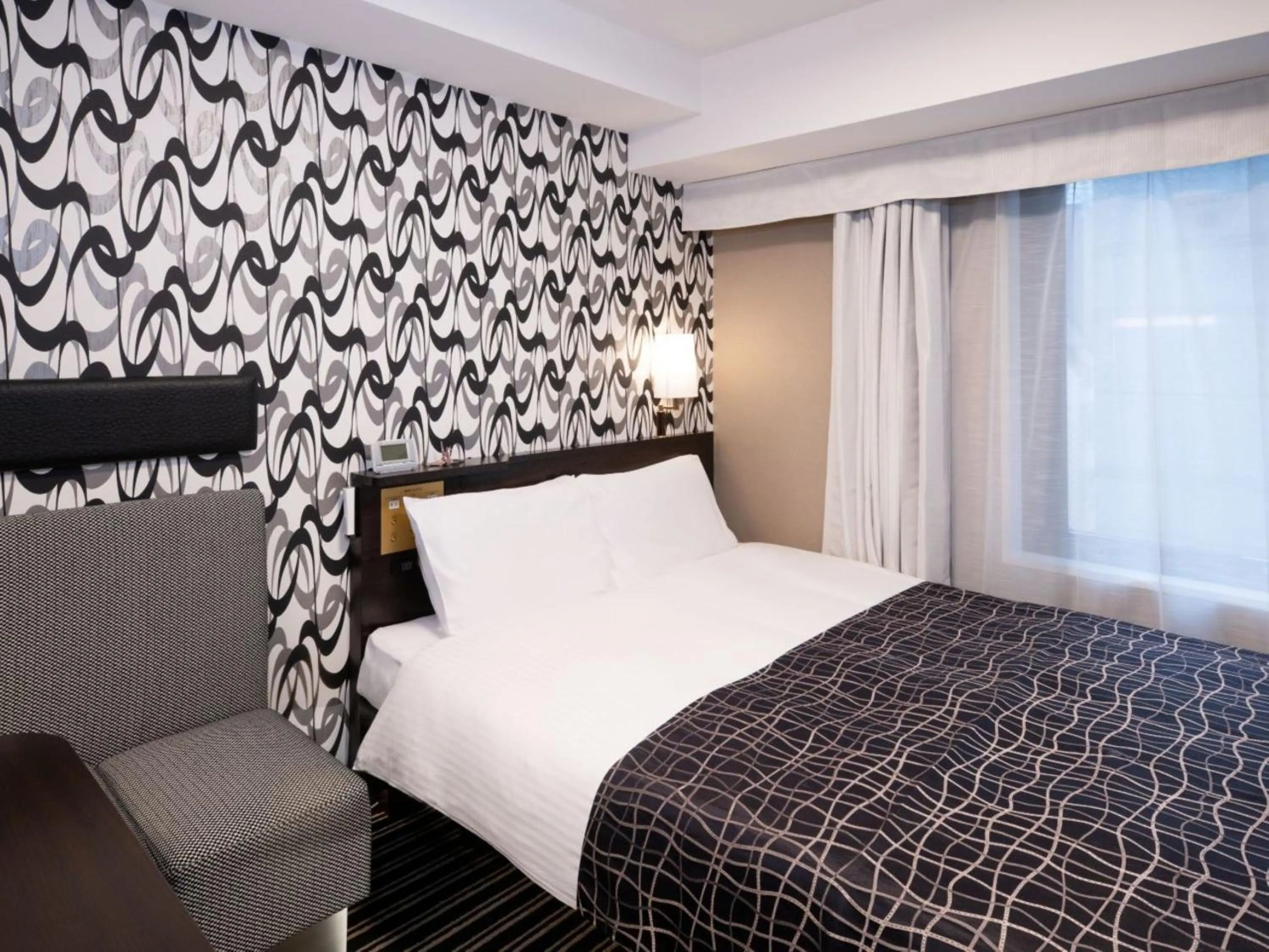 Bed in APA Hotel Tokyo Kudanshita