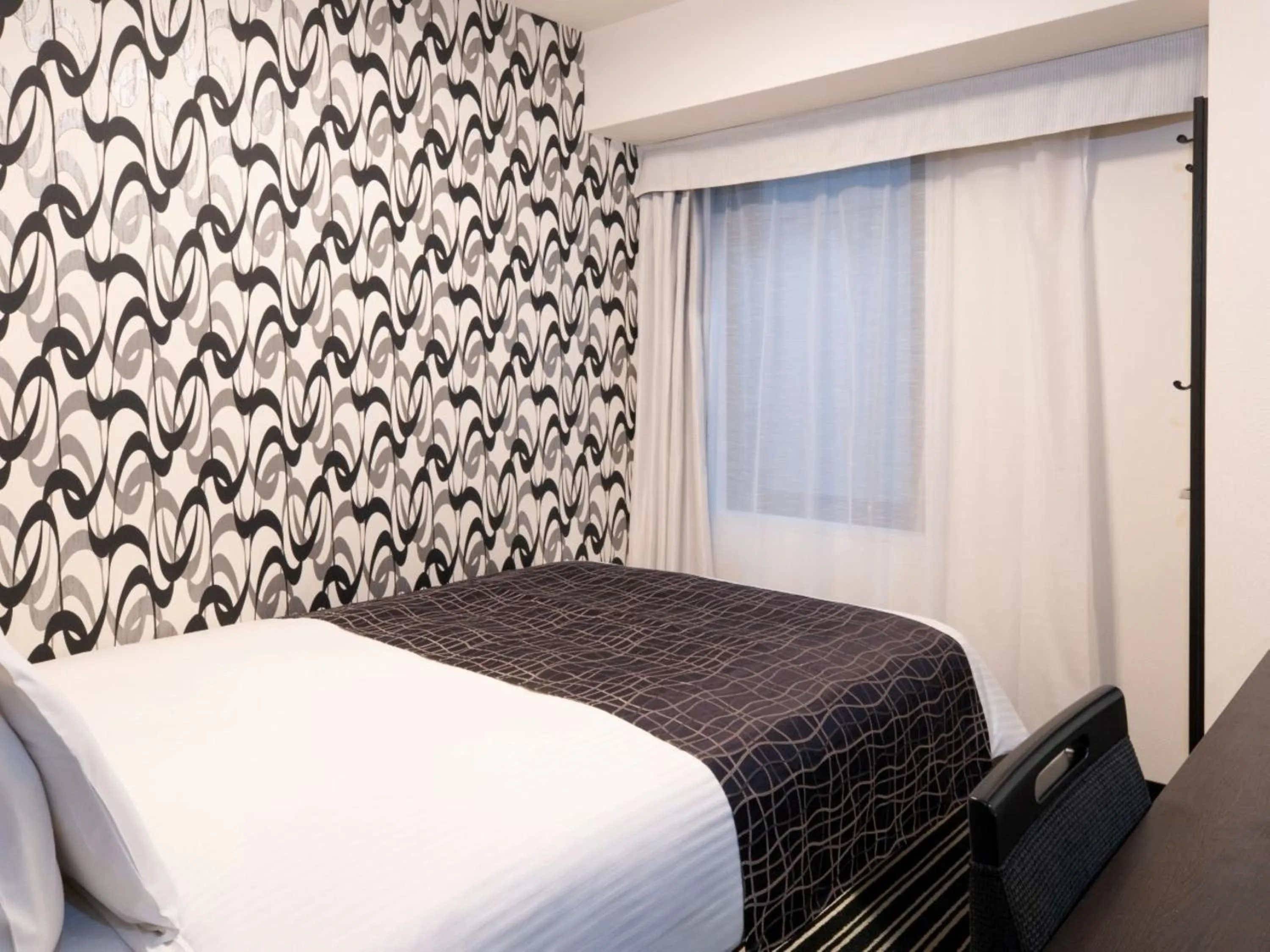 Bed in APA Hotel Tokyo Kudanshita