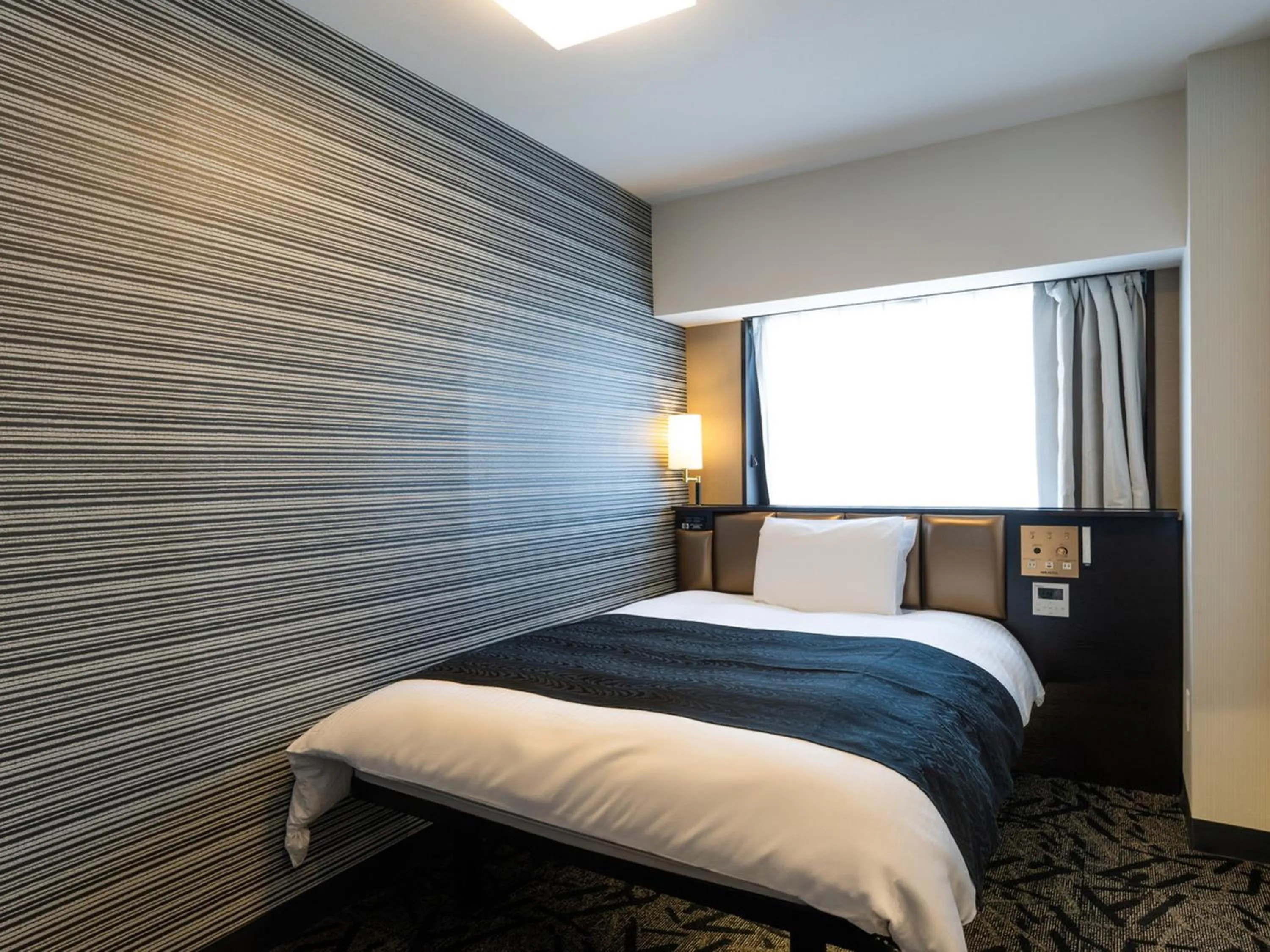 Bed in APA Hotel Tokyo Ojima