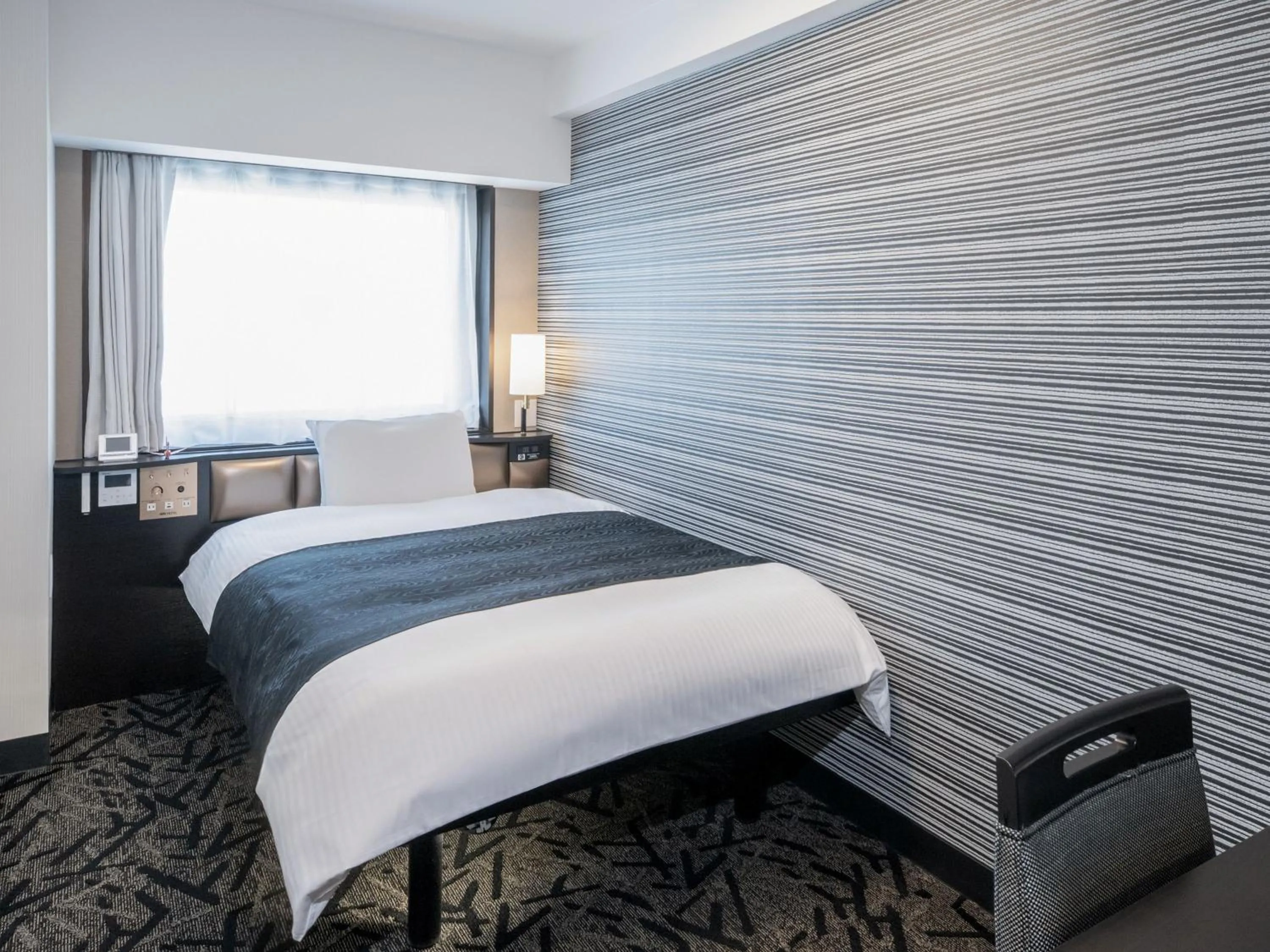 Bed in APA Hotel Tokyo Ojima