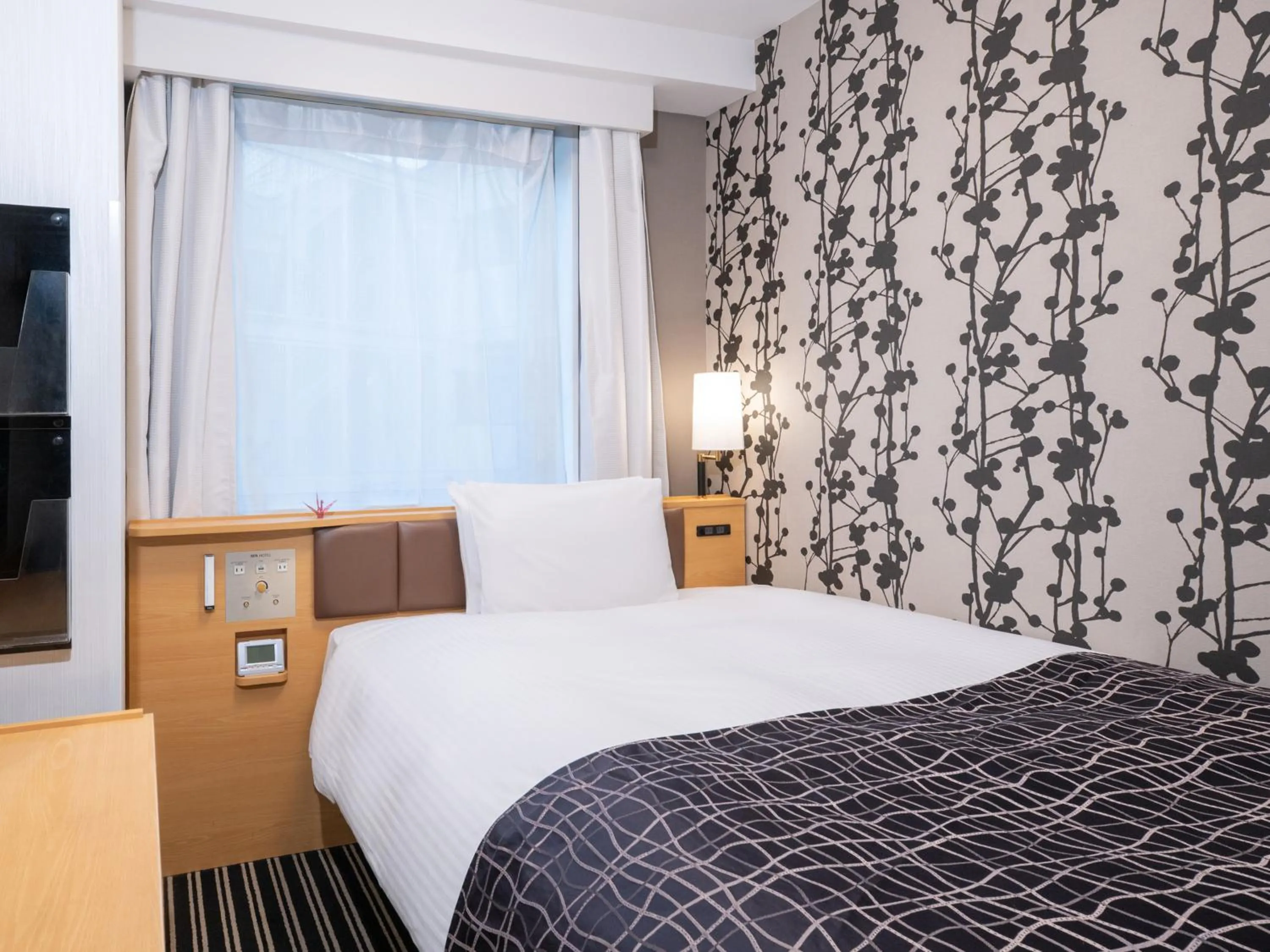 Bed in APA Hotel Tokyo Itabashi Ekimae