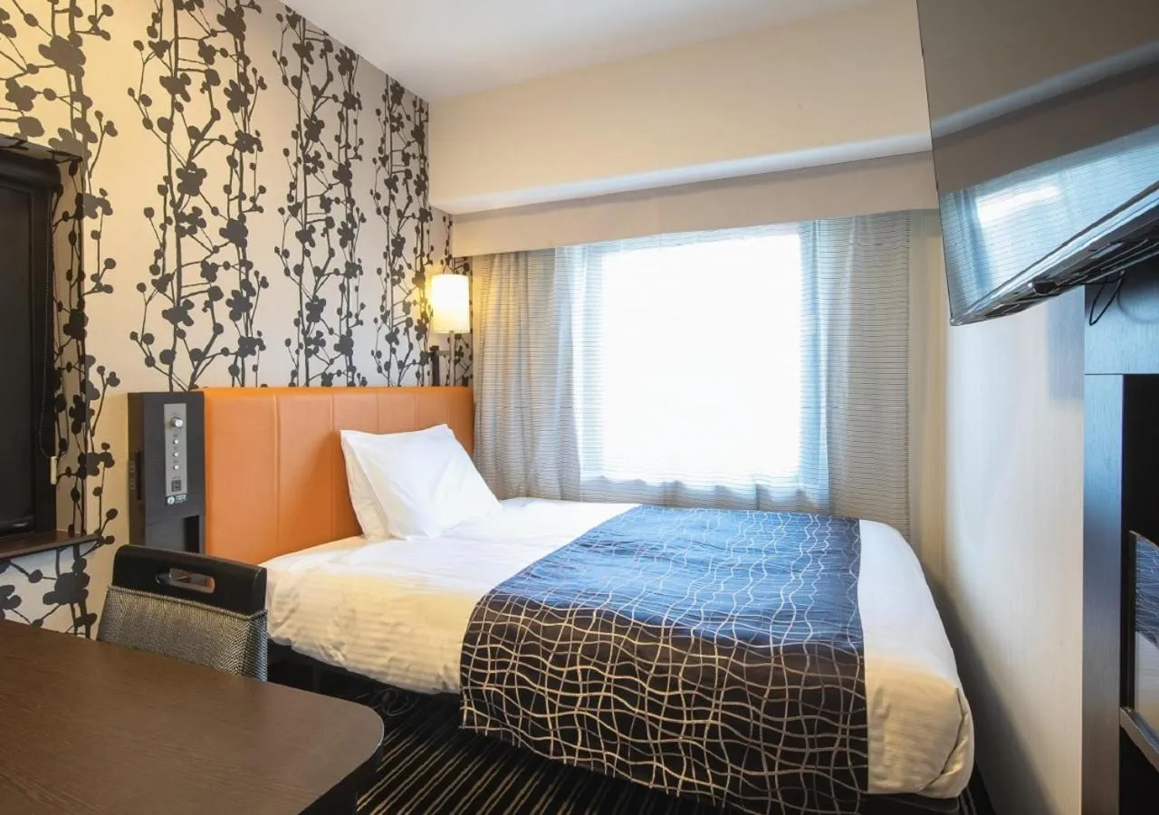 Bed in APA Hotel Namba Shinsaibashi
