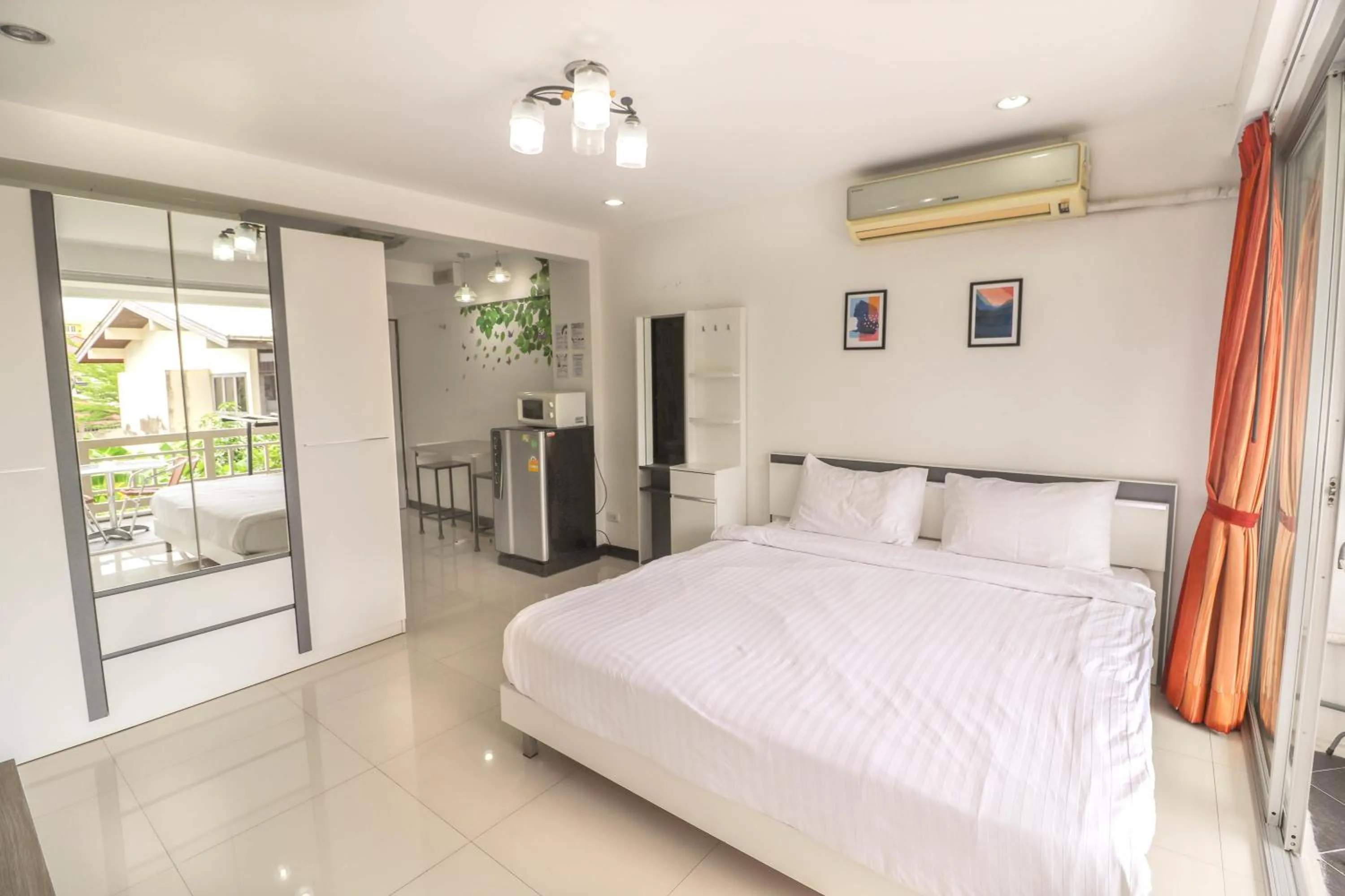 Bed in Baan Sabai Rama IV Apartment