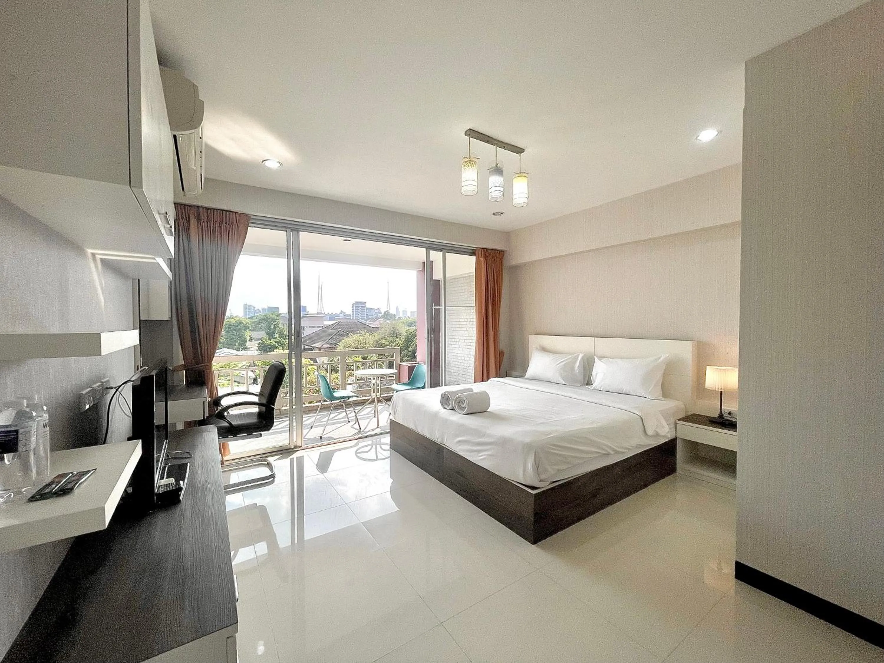Photo of the whole room, Bed in Baan Sabai Rama IV Apartment