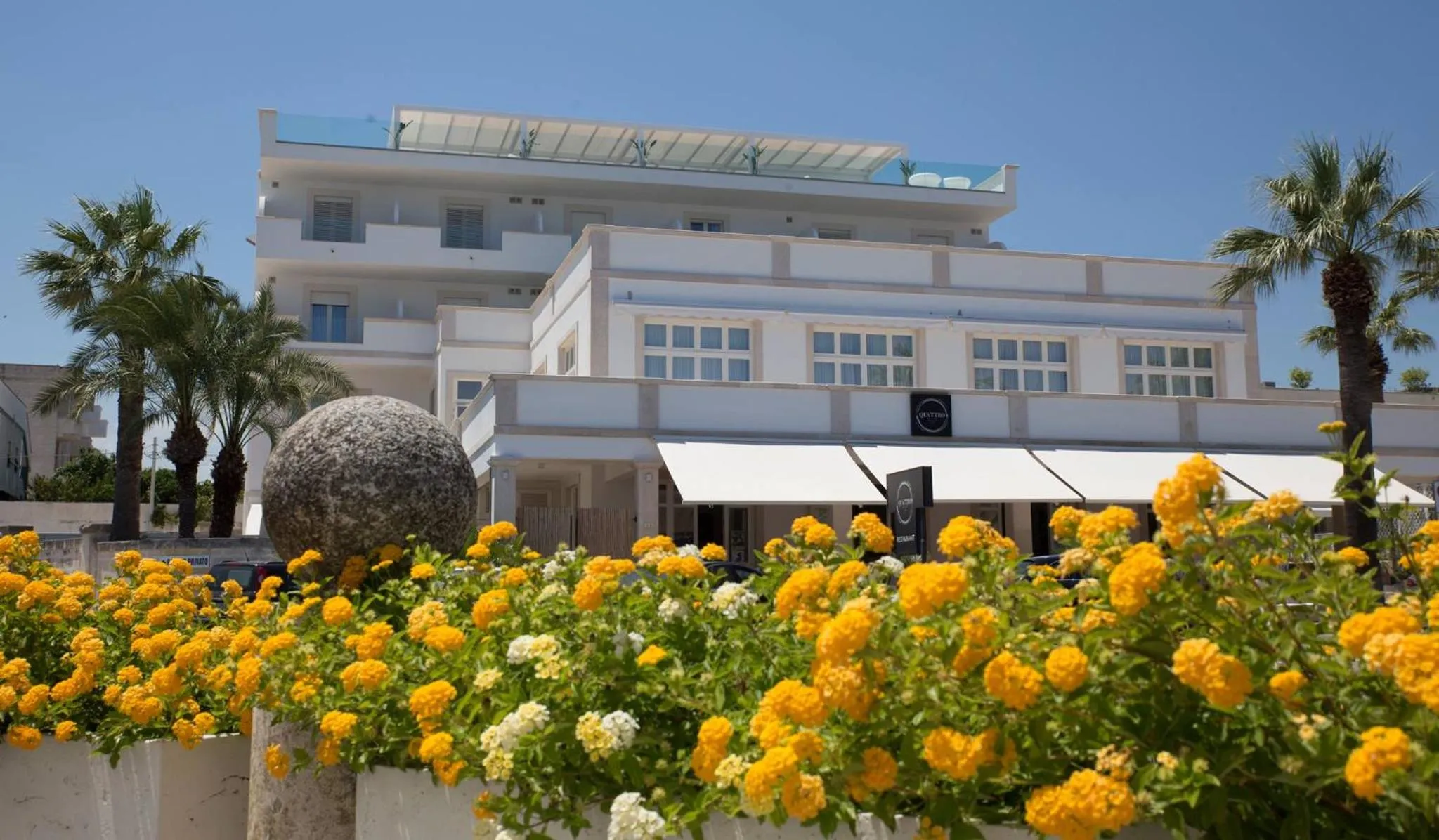 Property building in Bianco Riccio Suite Hotel