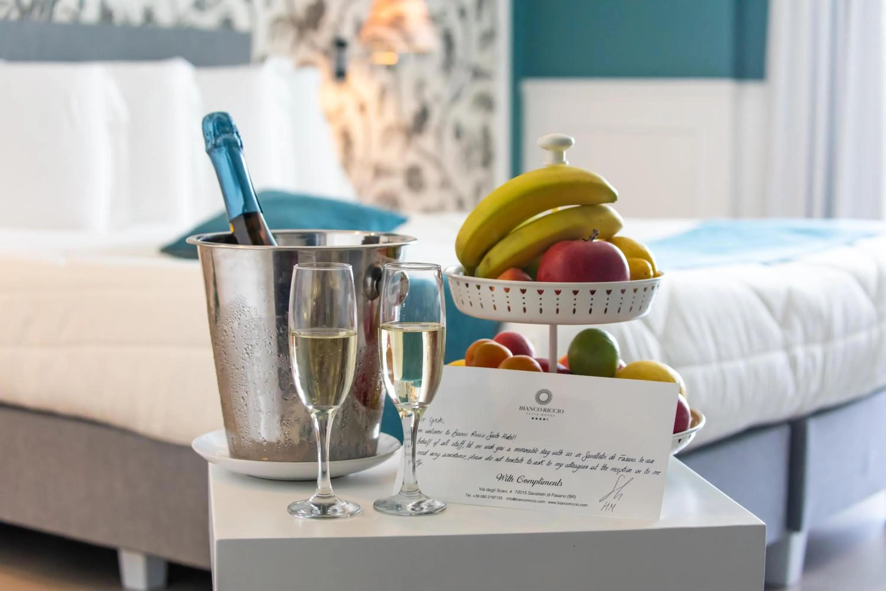 Bed in Bianco Riccio Suite Hotel