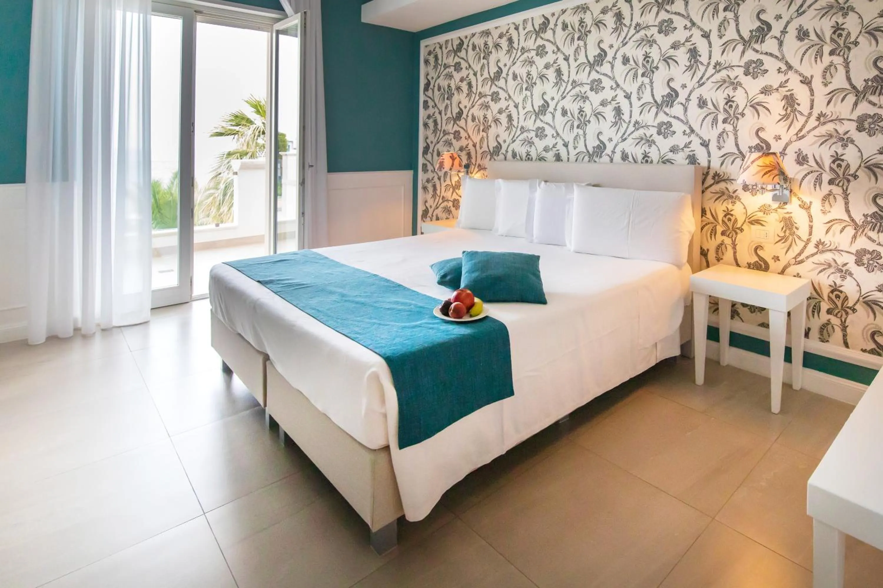 Bed in Bianco Riccio Suite Hotel