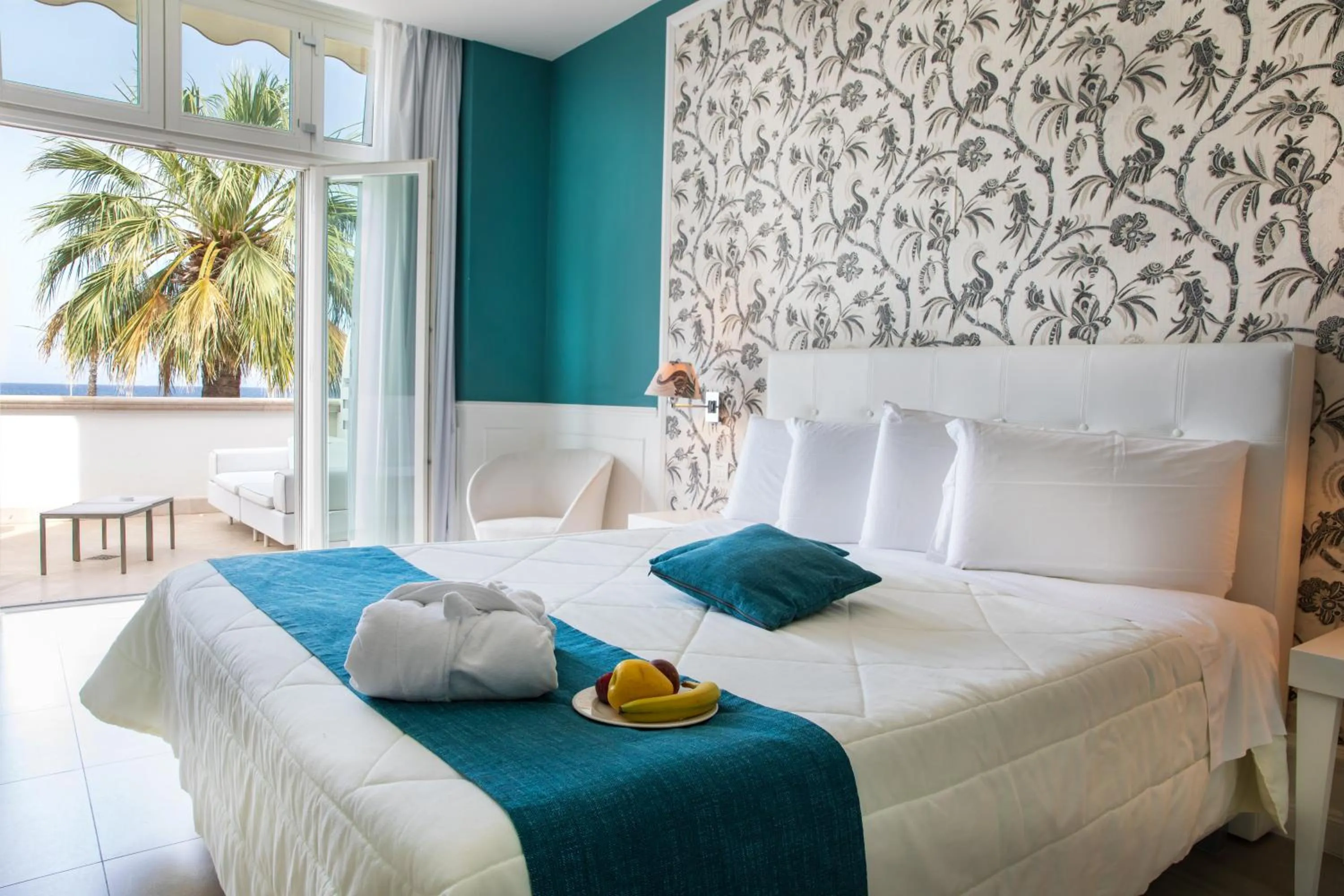 Bed in Bianco Riccio Suite Hotel