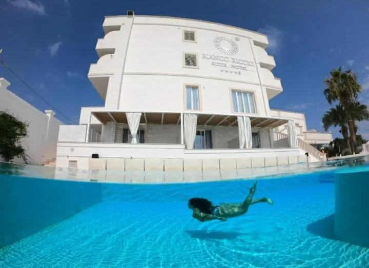 Property building in Bianco Riccio Suite Hotel