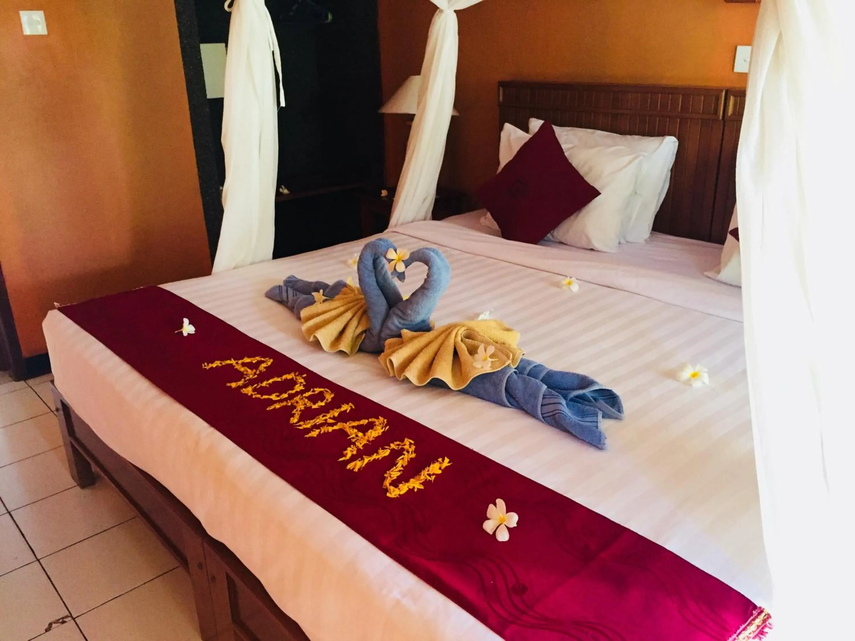 Bed in Kubuku Eco Dive Lodge and Yoga