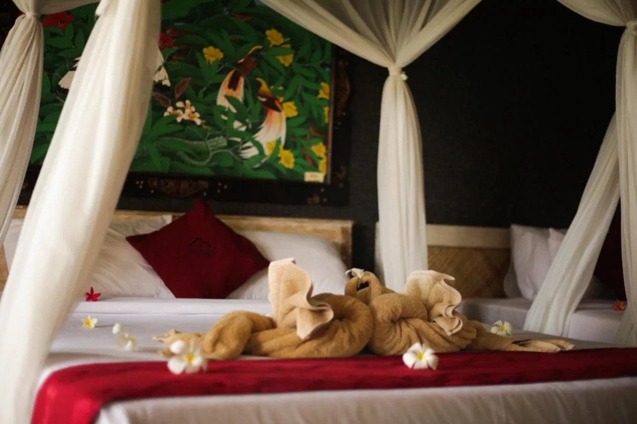 Bed in Kubuku Eco Dive Lodge and Yoga