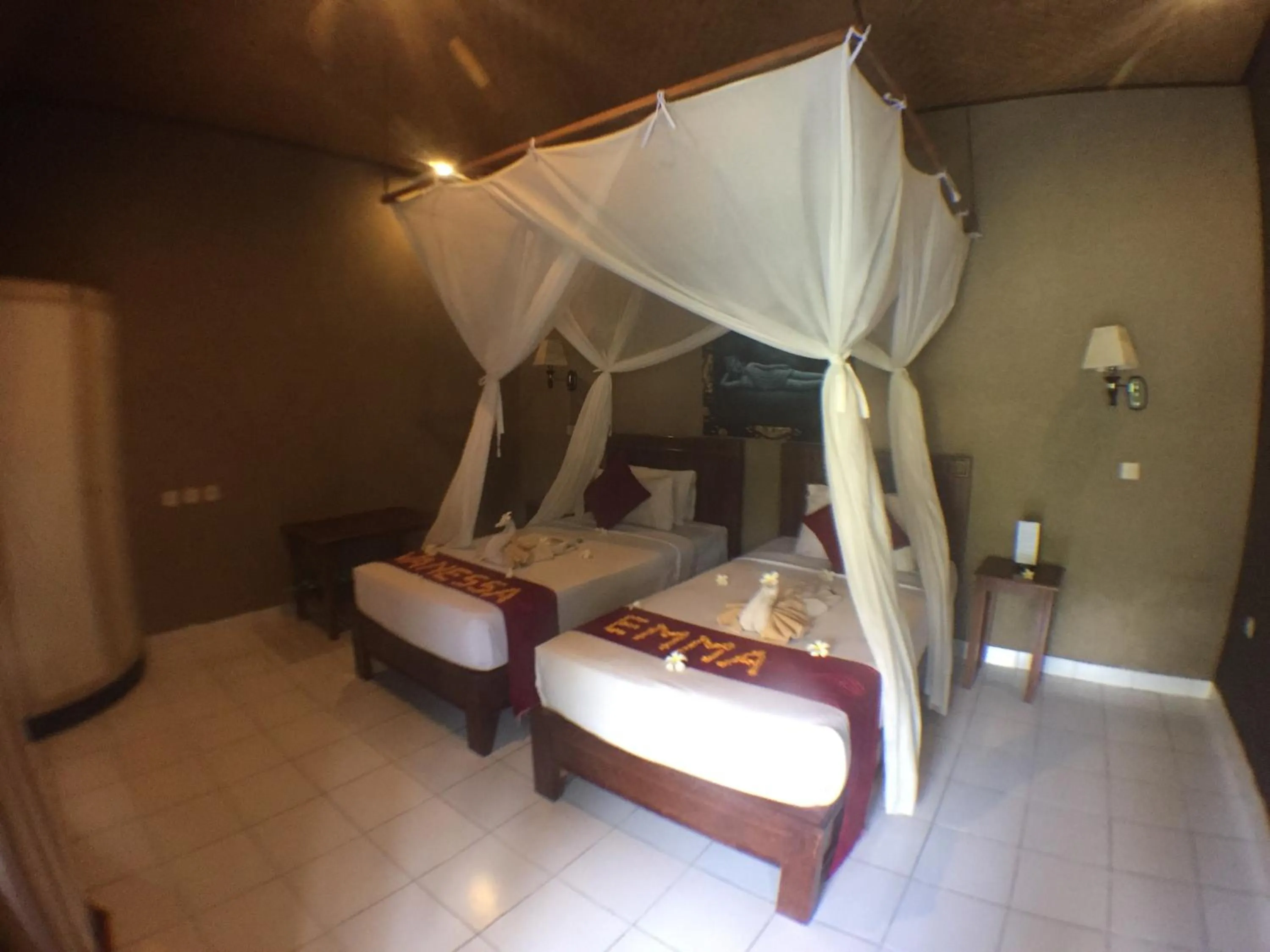 Bed in Kubuku Eco Dive Lodge and Yoga