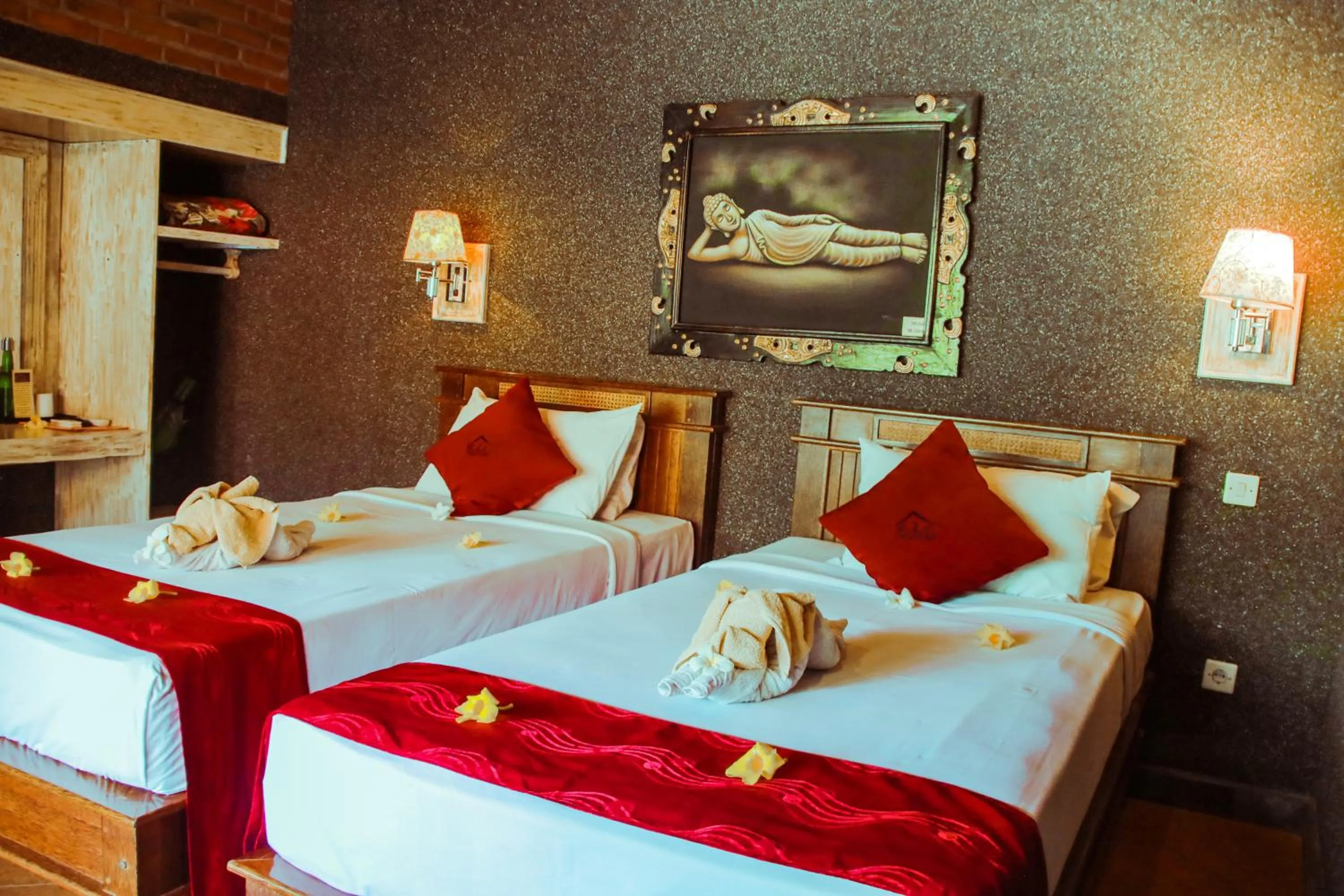 Bed in Kubuku Eco Dive Lodge and Yoga