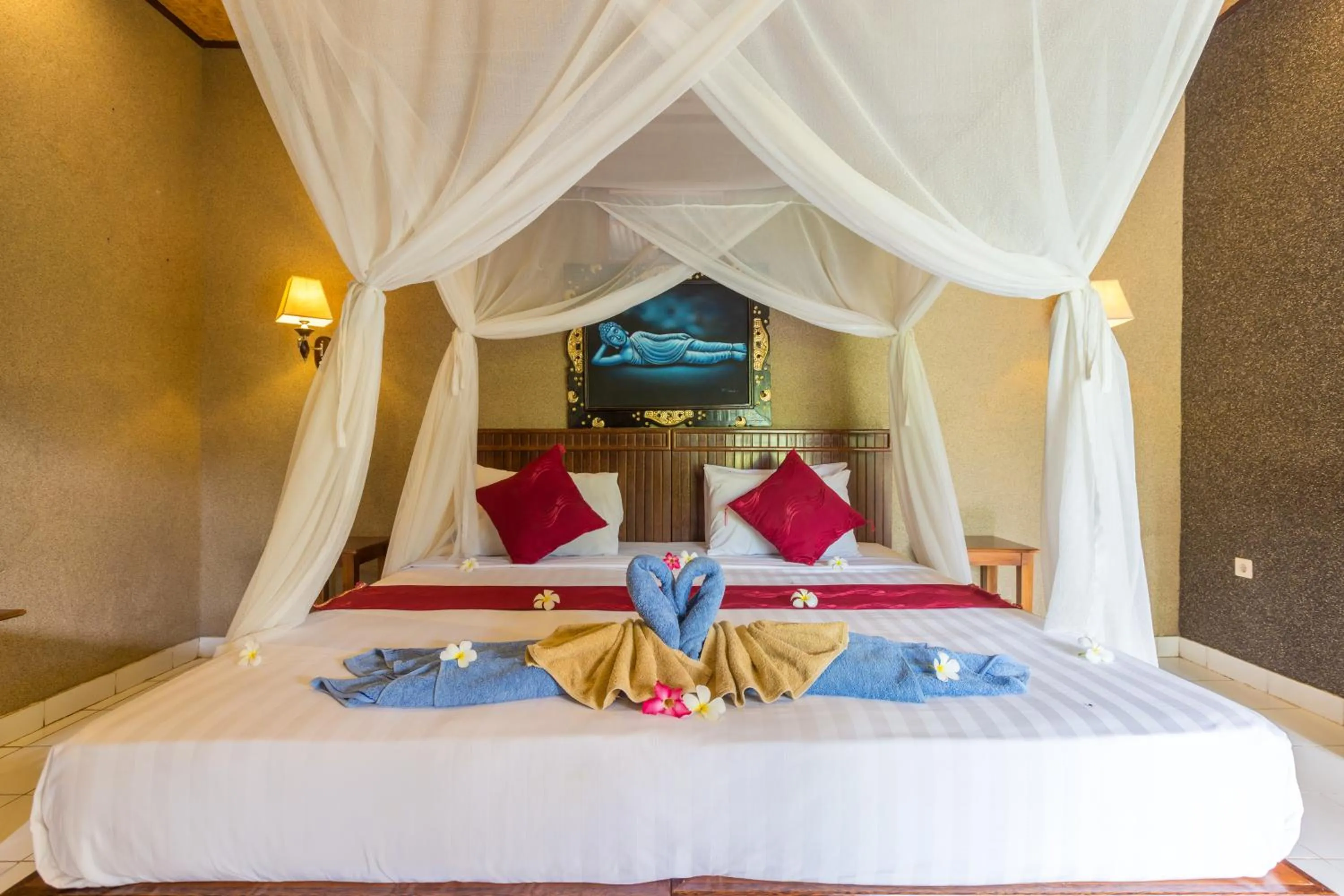 Bed in Kubuku Eco Dive Lodge and Yoga