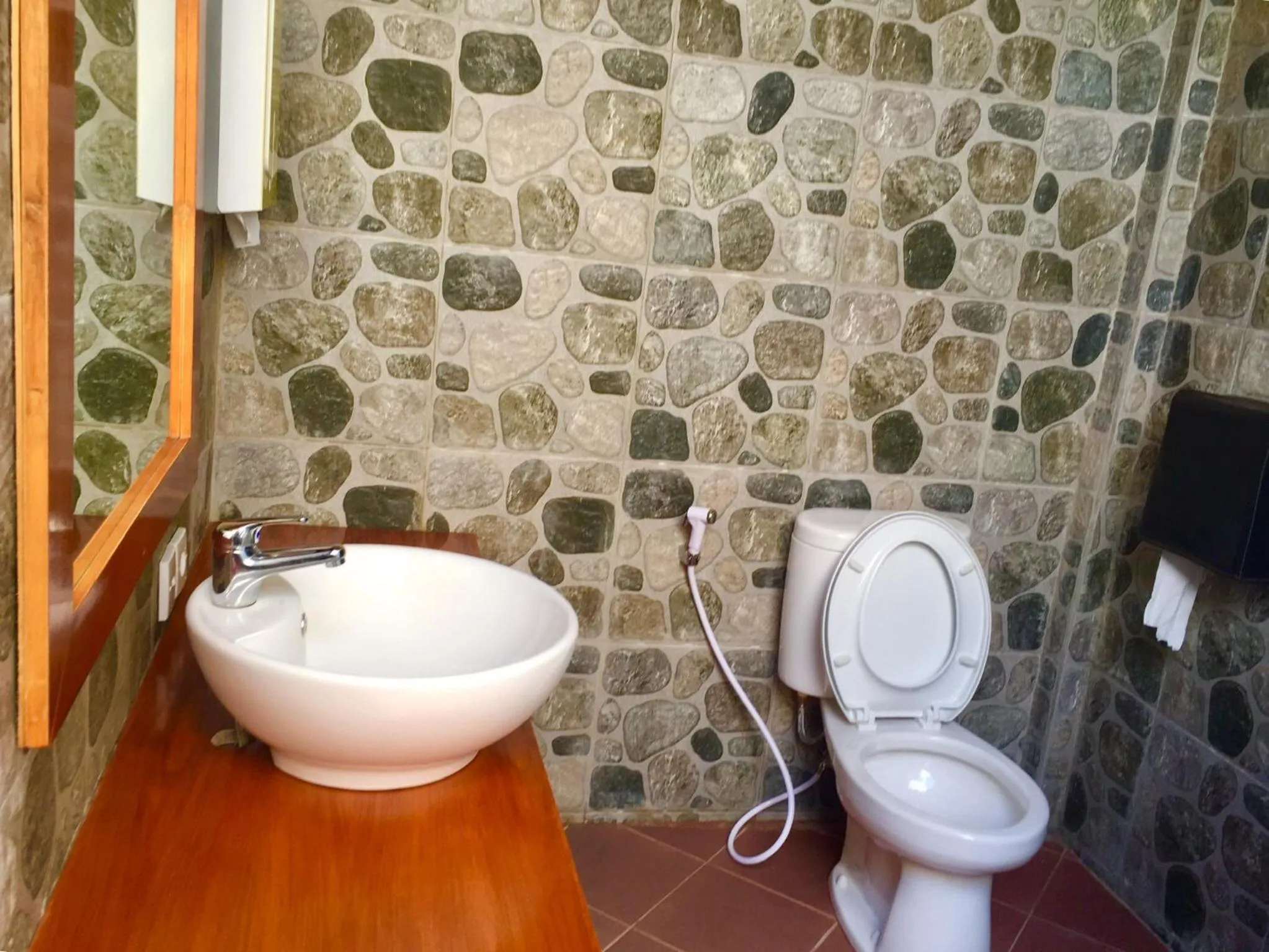 Toilet in Kubuku Eco Dive Lodge and Yoga