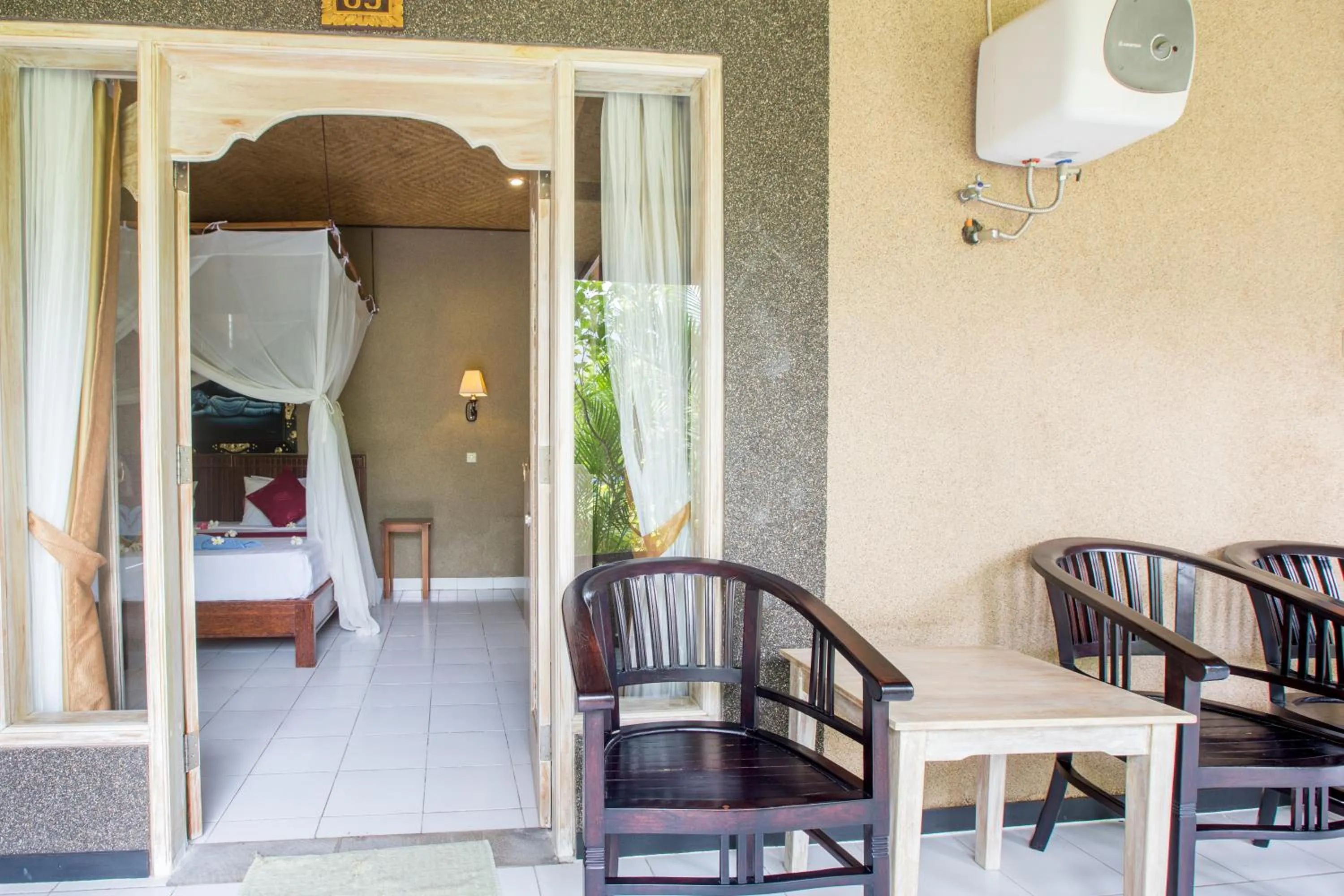 Balcony/Terrace, Bed in Kubuku Eco Dive Lodge and Yoga