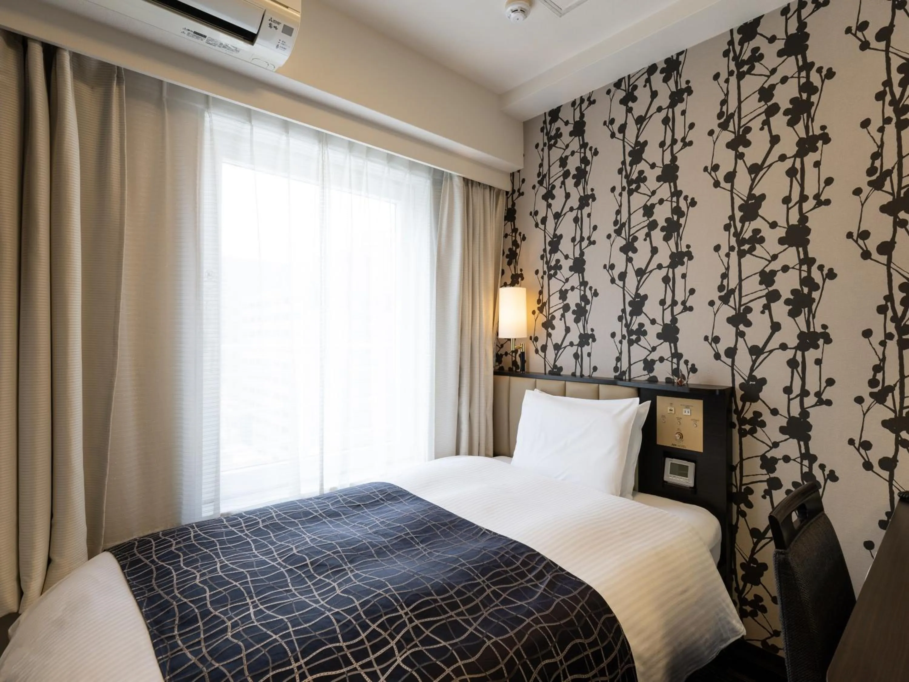 Photo of the whole room, Bed in APA Hotel Kobe Sannomiya