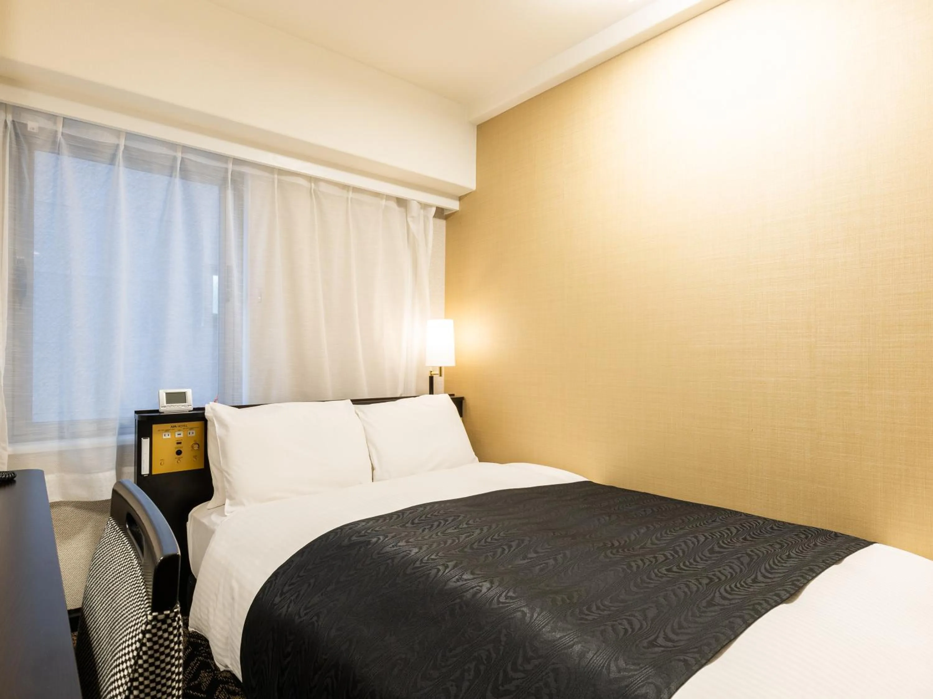 Photo of the whole room, Bed in APA Hotel Himeji Ekikita