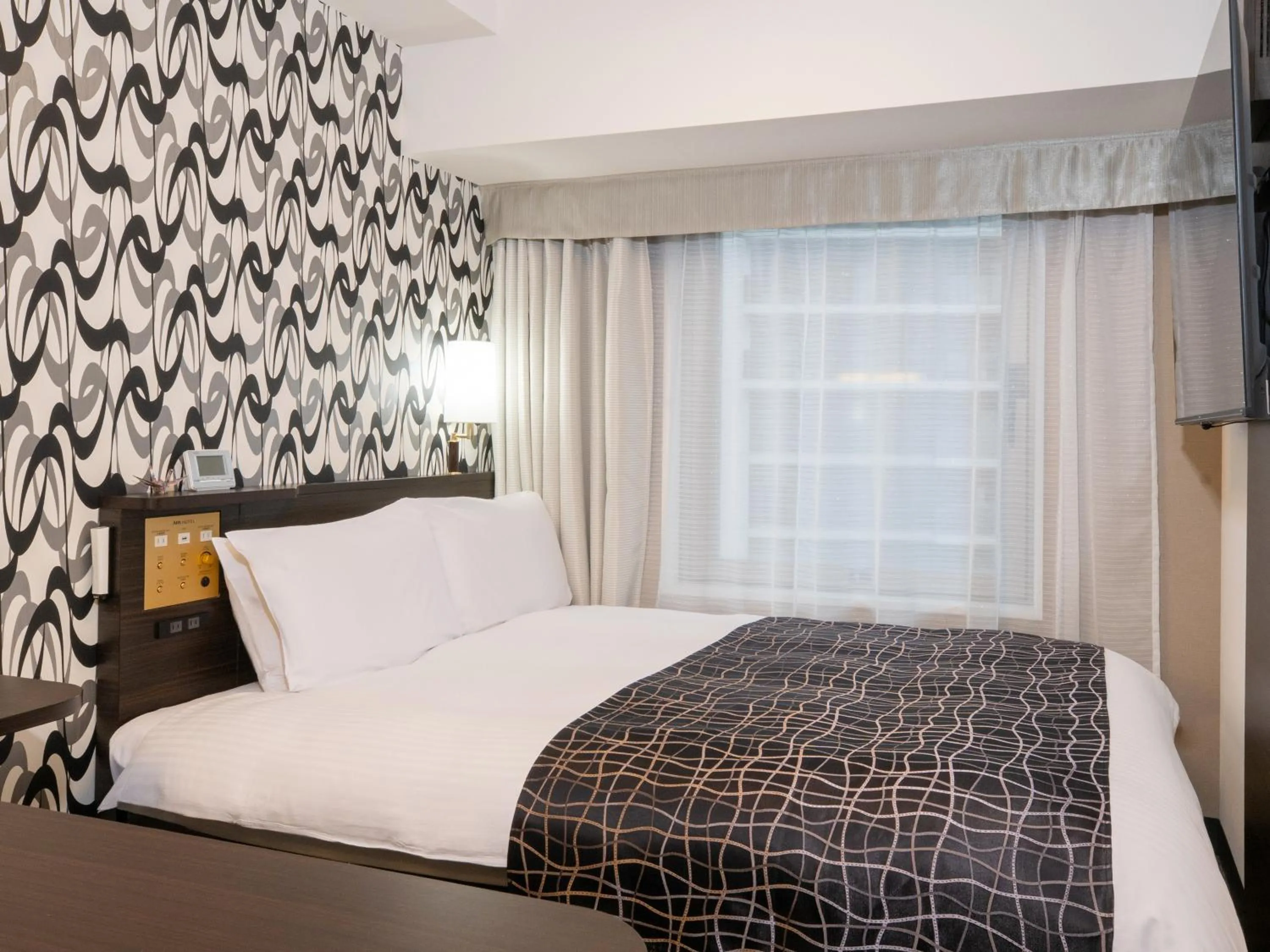 Photo of the whole room, Bed in APA Hotel Shimbashi Onarimon