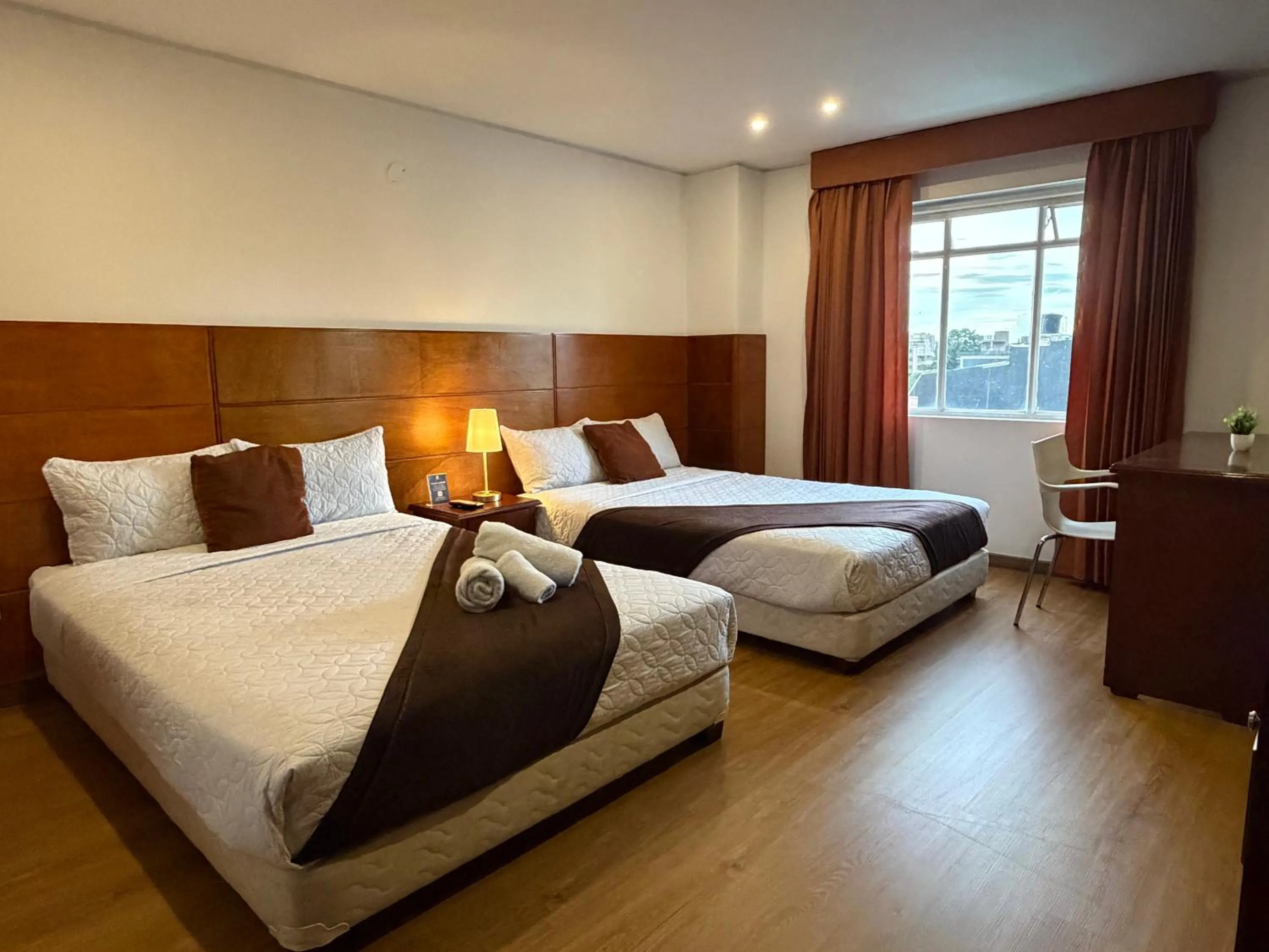 Bed in Blu Inn Hotel