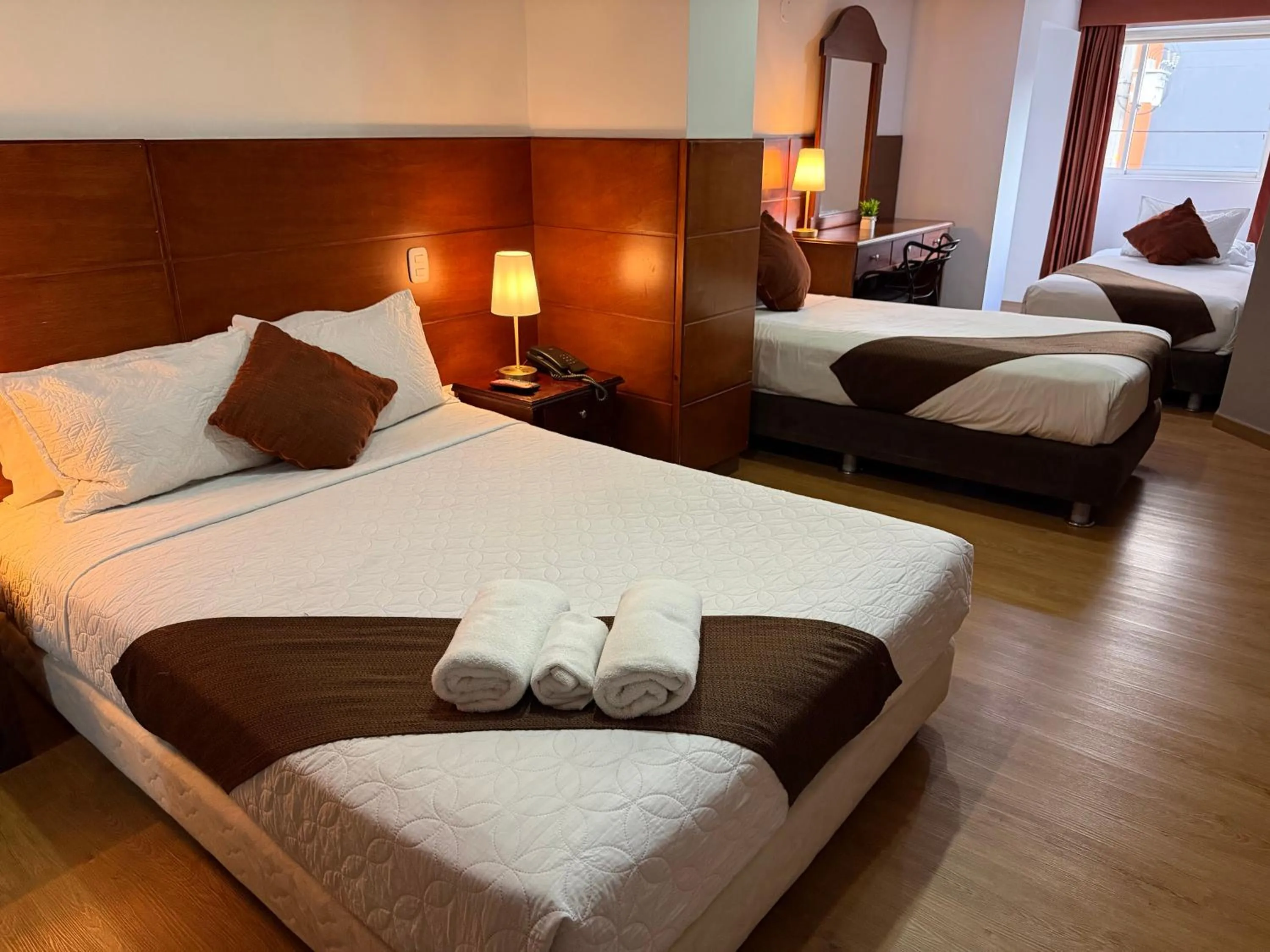 Bed in Blu Inn Hotel