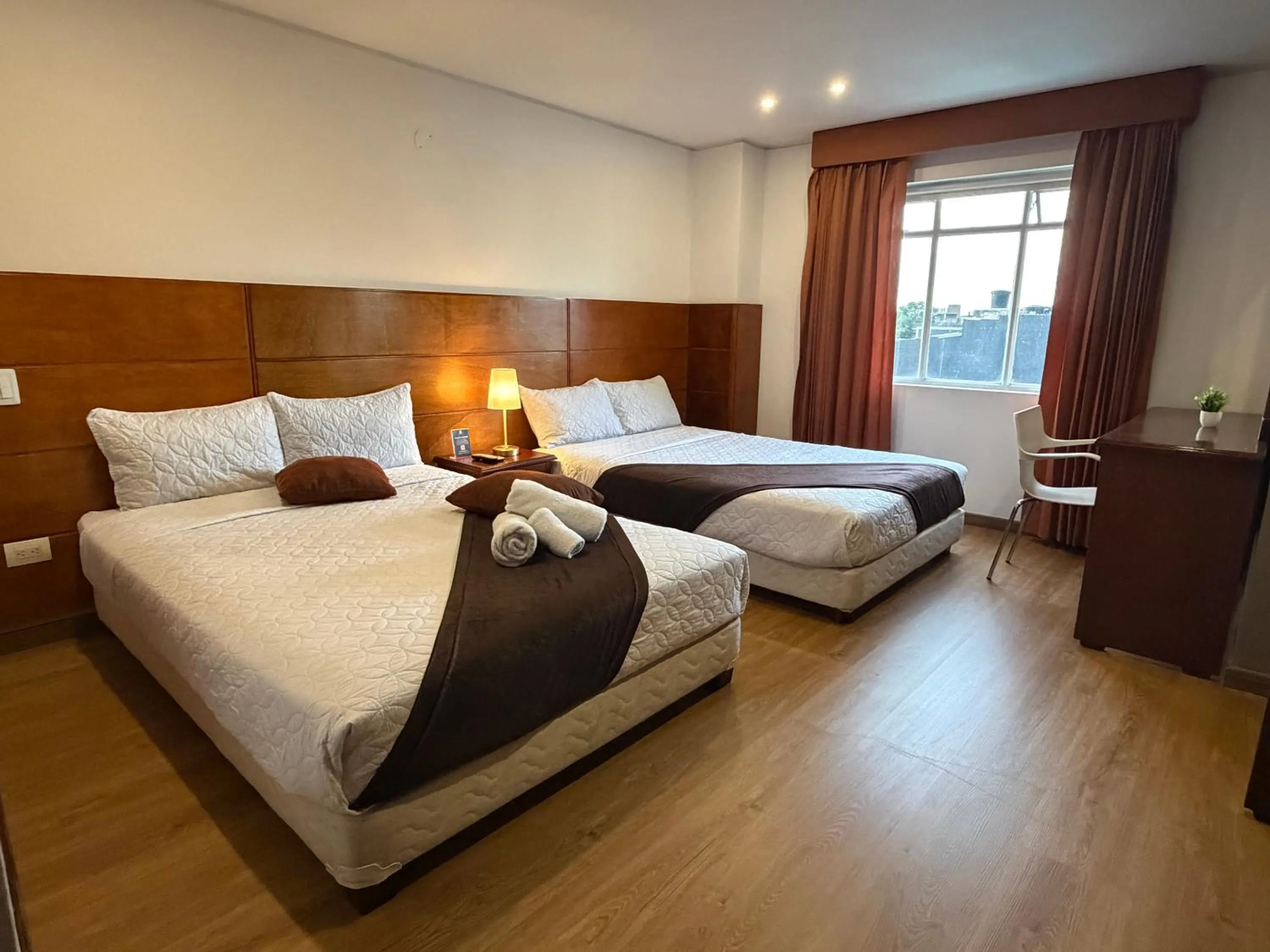 Bed in Blu Inn Hotel