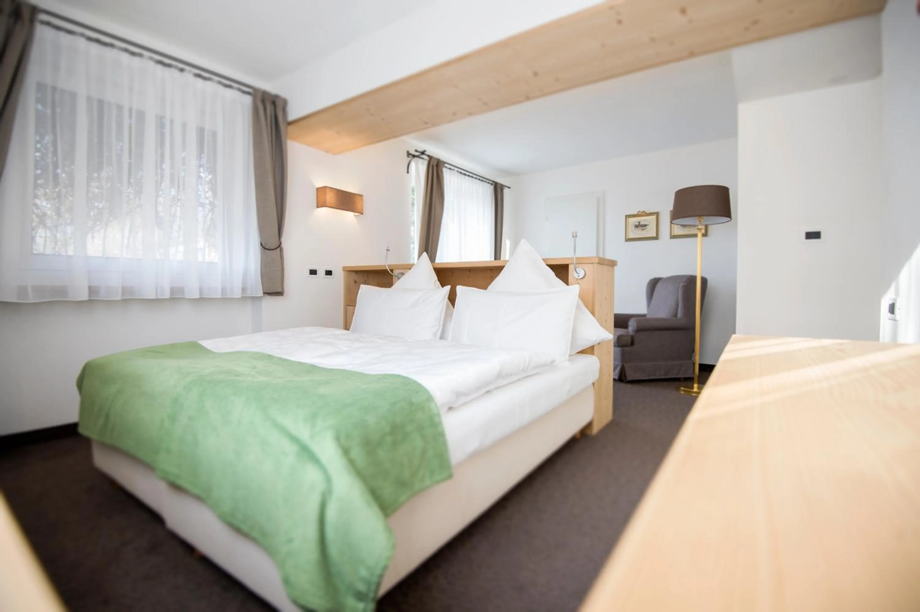 Bed in Alpstay - Chalet Hotel Hartmann - Adults Only