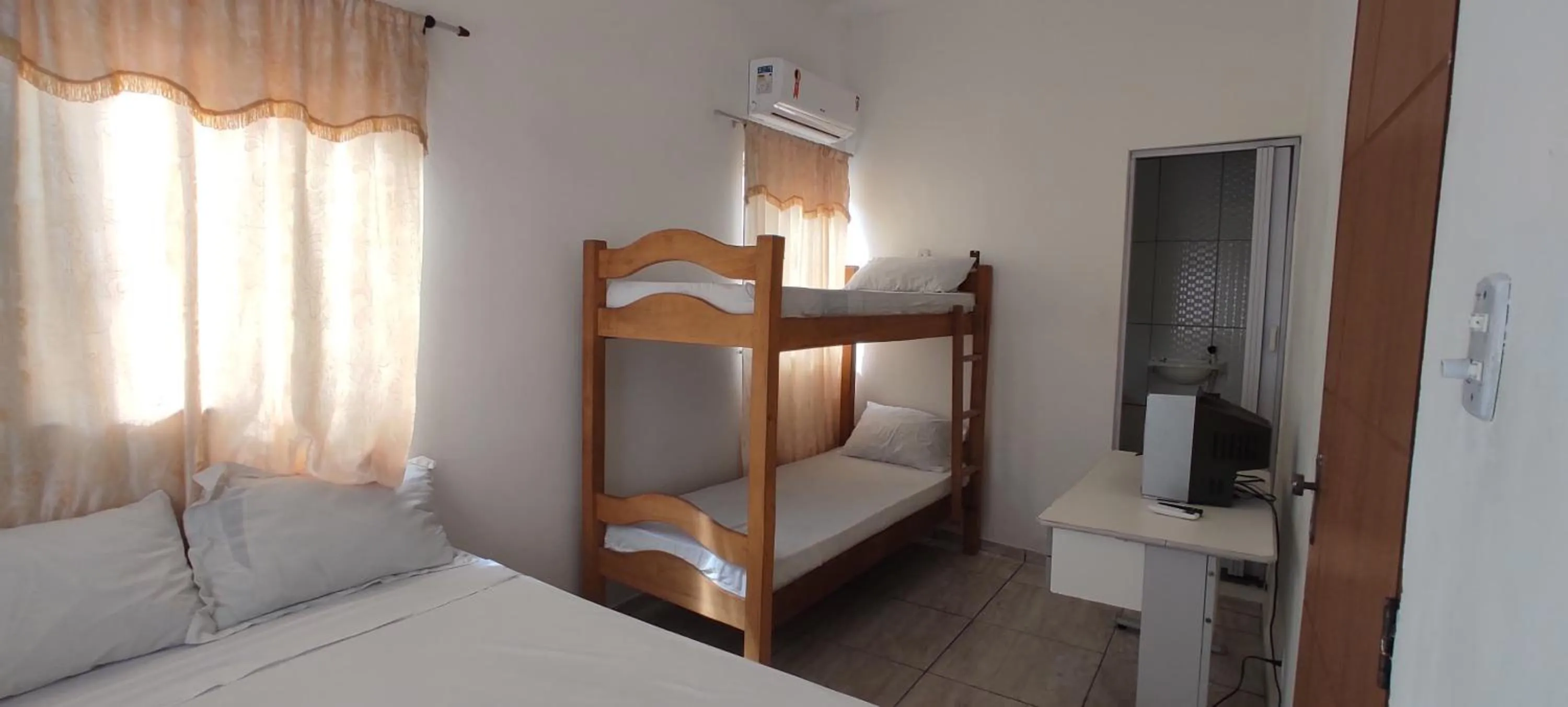 Bed in Pousada Zumbi dos Palmares