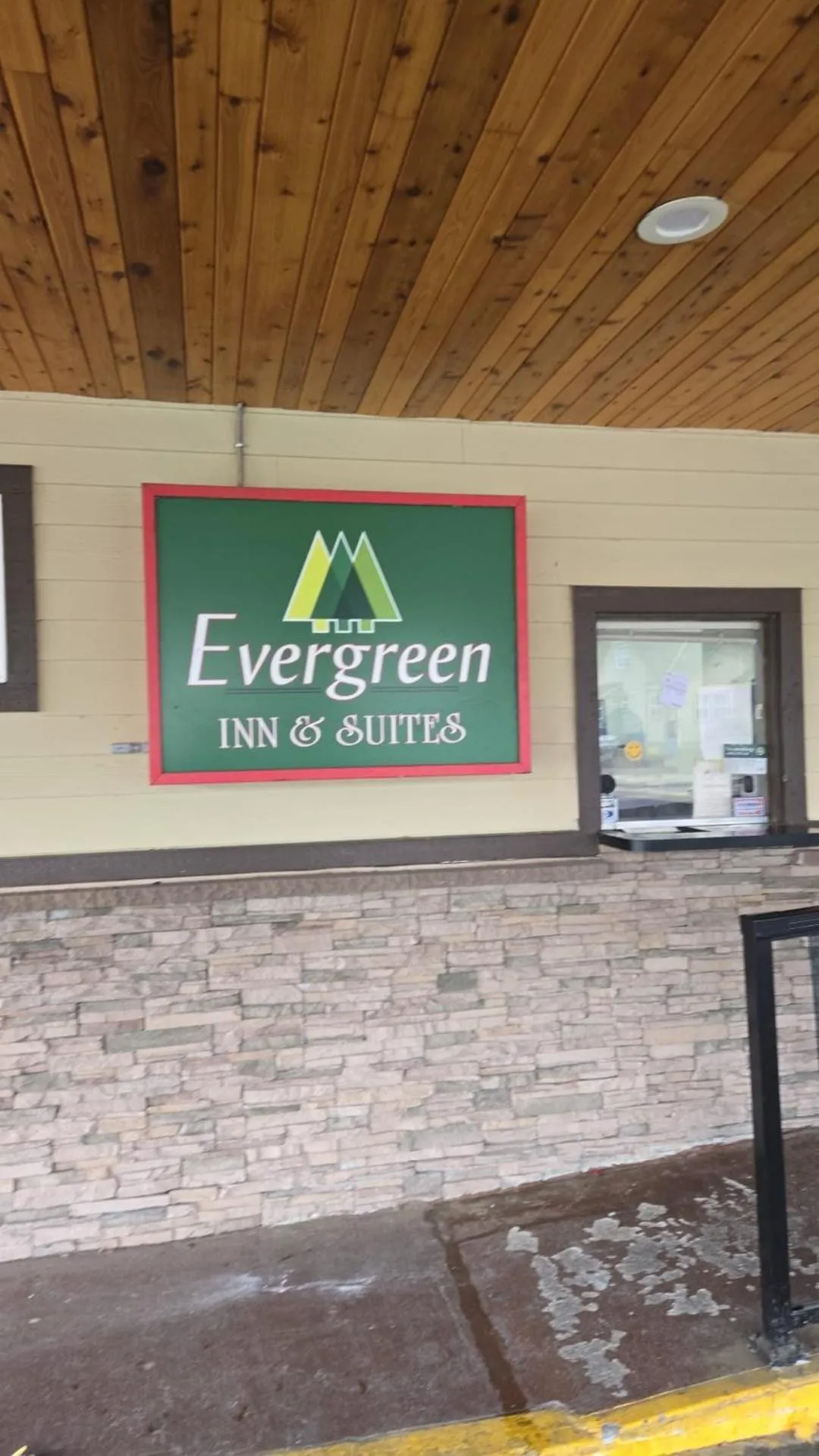 Property logo or sign in Evergreen Inn & Suites Portland