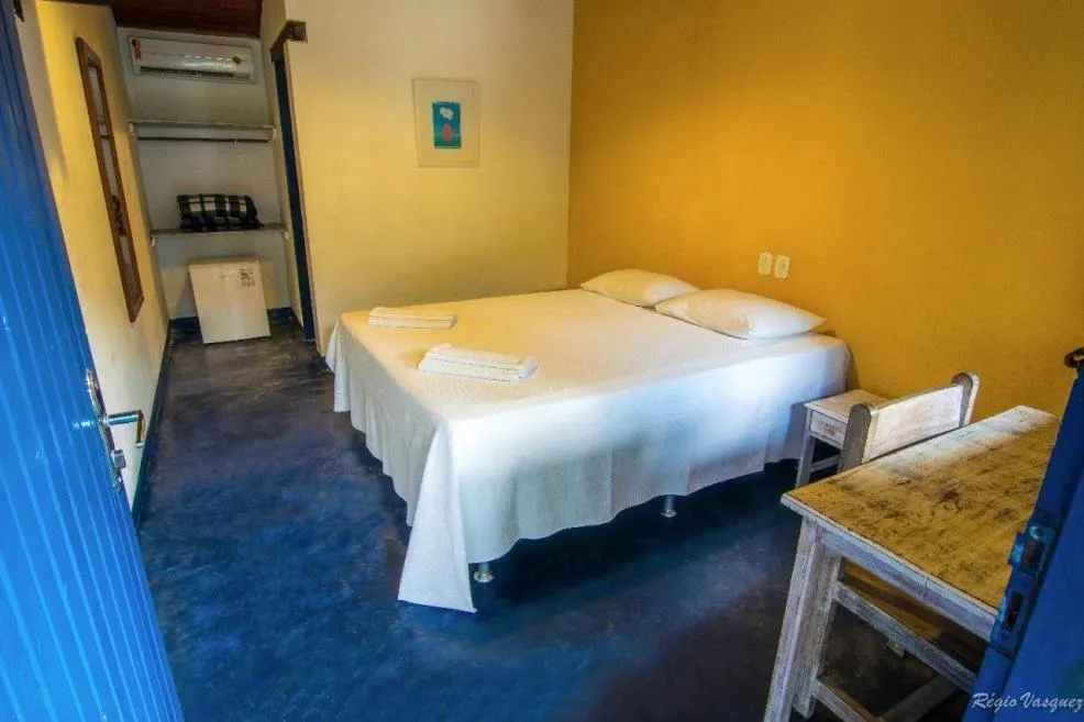 Bed in Pousada Sao Luiz