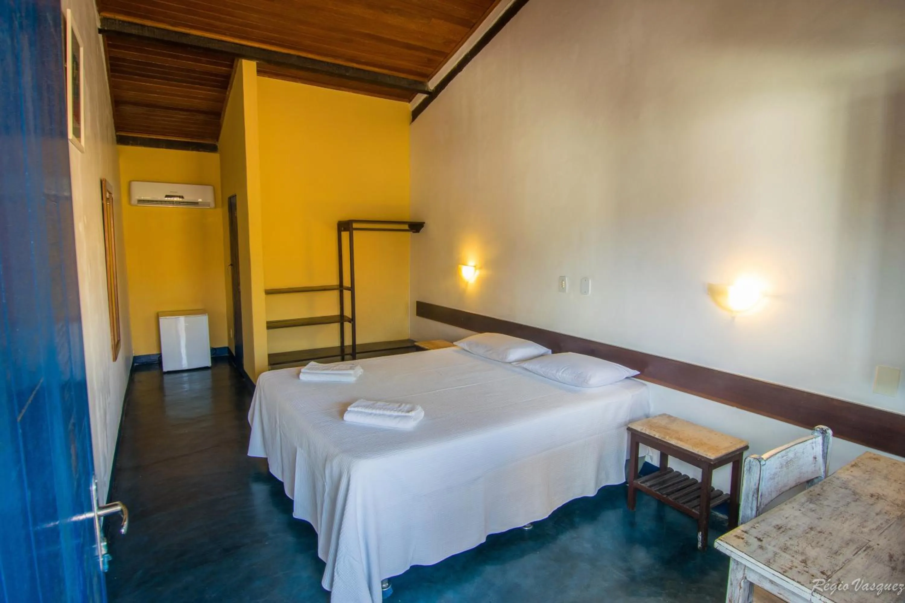 Bed in Pousada Sao Luiz