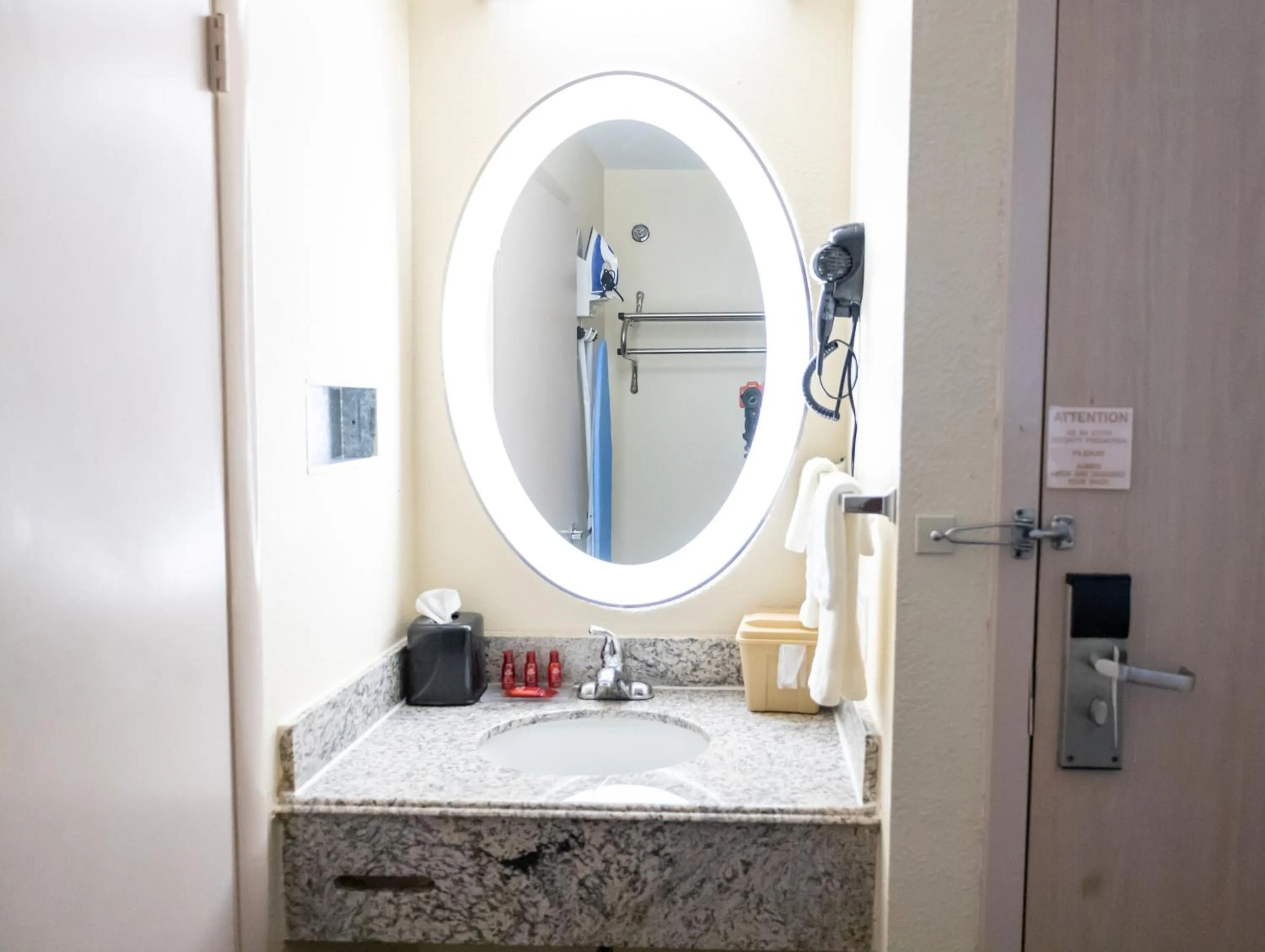 Bathroom in Baymont by Wyndham College Park Atlanta Airport South