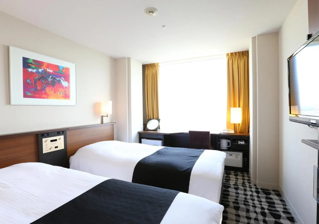 Bed in APA Hotel & Resort Tokyo Bay Makuhari