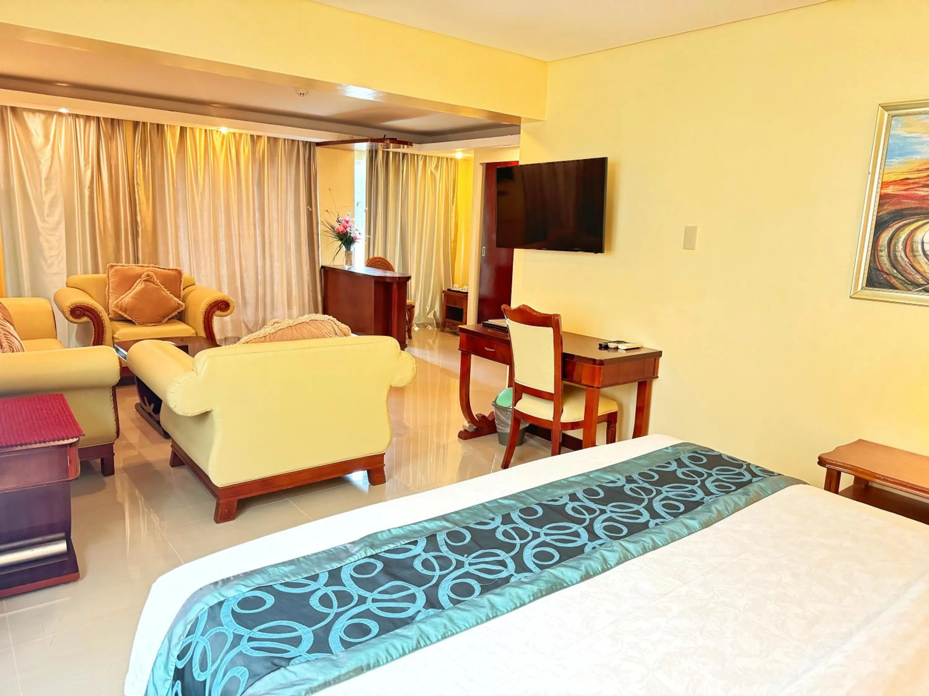 Bed in Golden Phoenix Hotel Boracay