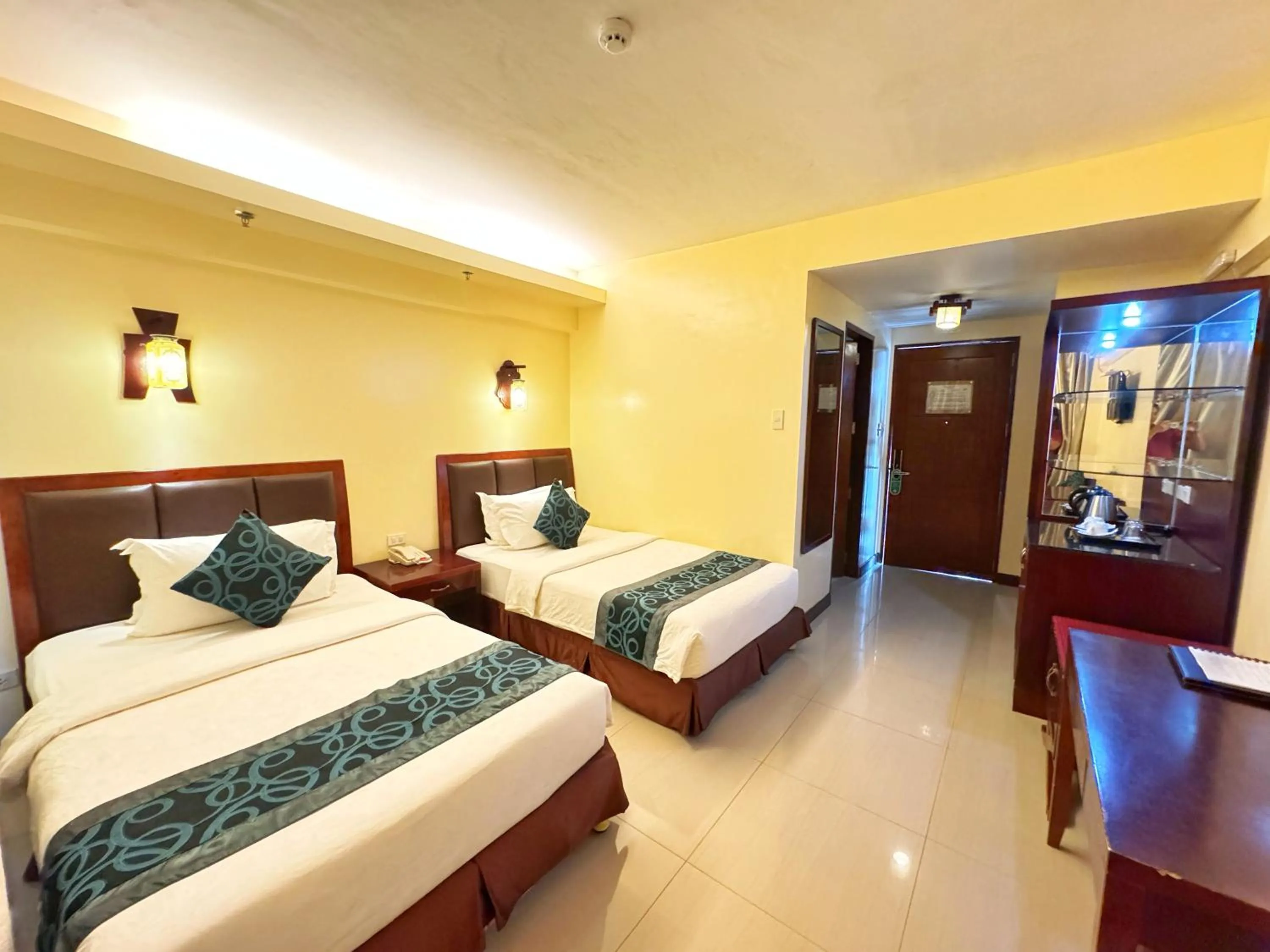 Photo of the whole room, Bed in Golden Phoenix Hotel Boracay