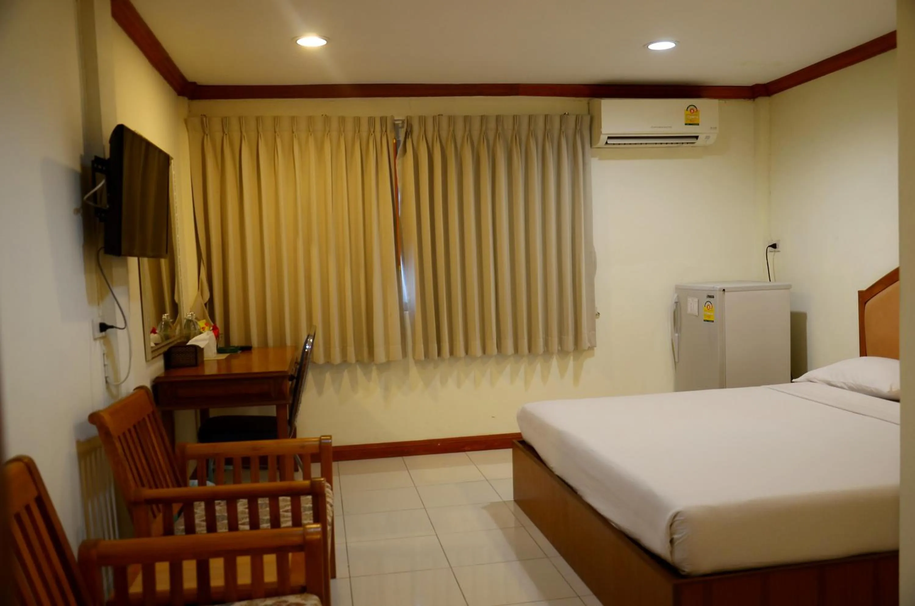 Photo of the whole room, Bed in At Bangkok Hotel