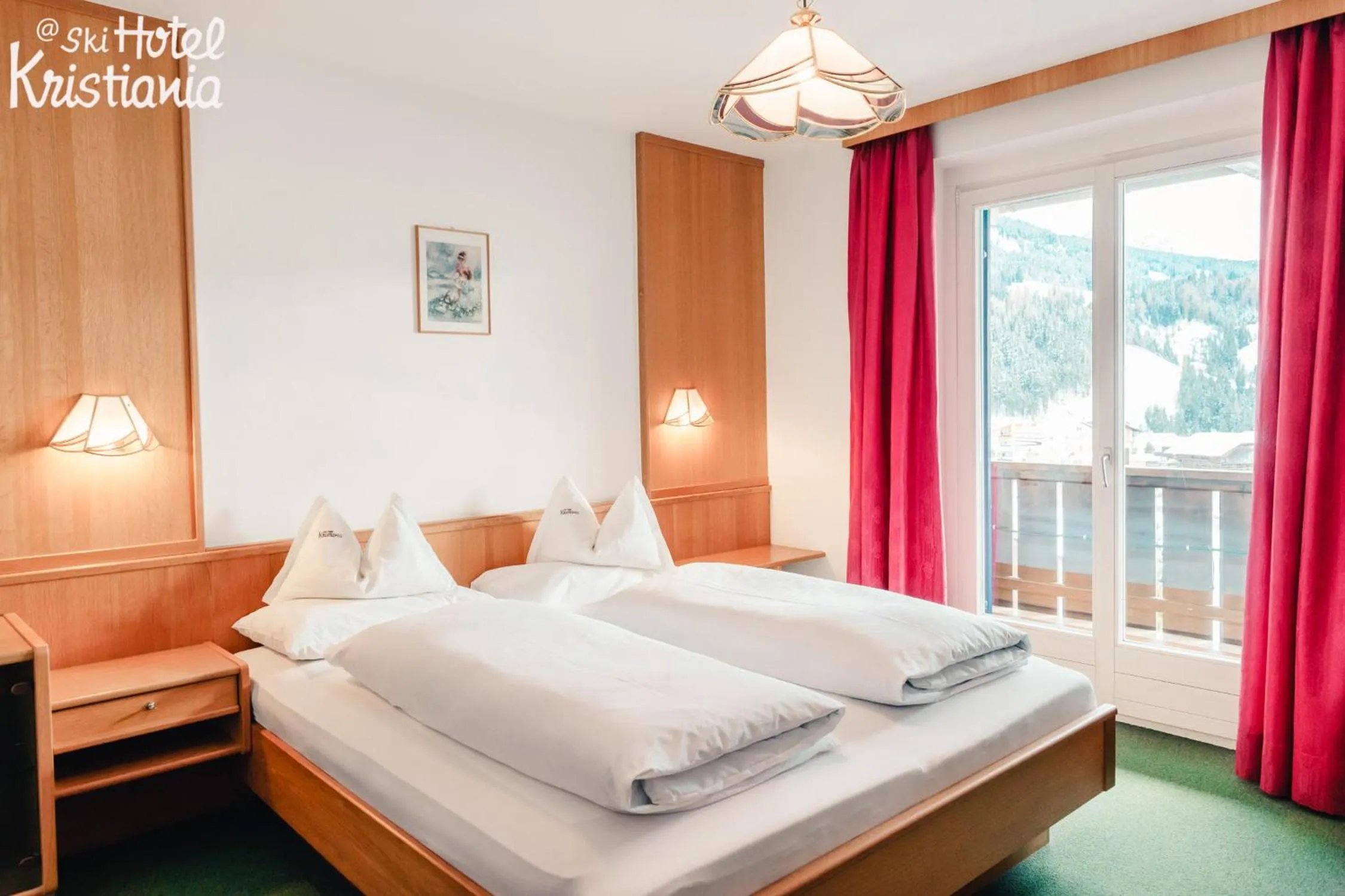 Bed in Kristiania Small Dolomites Hotel