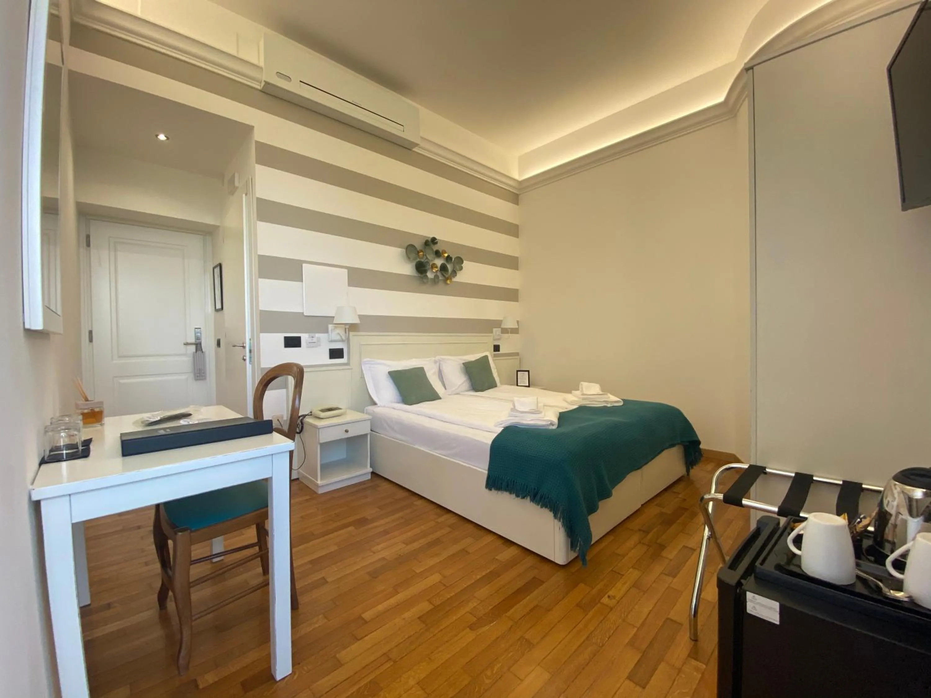 Bedroom in Hotel La Fontana