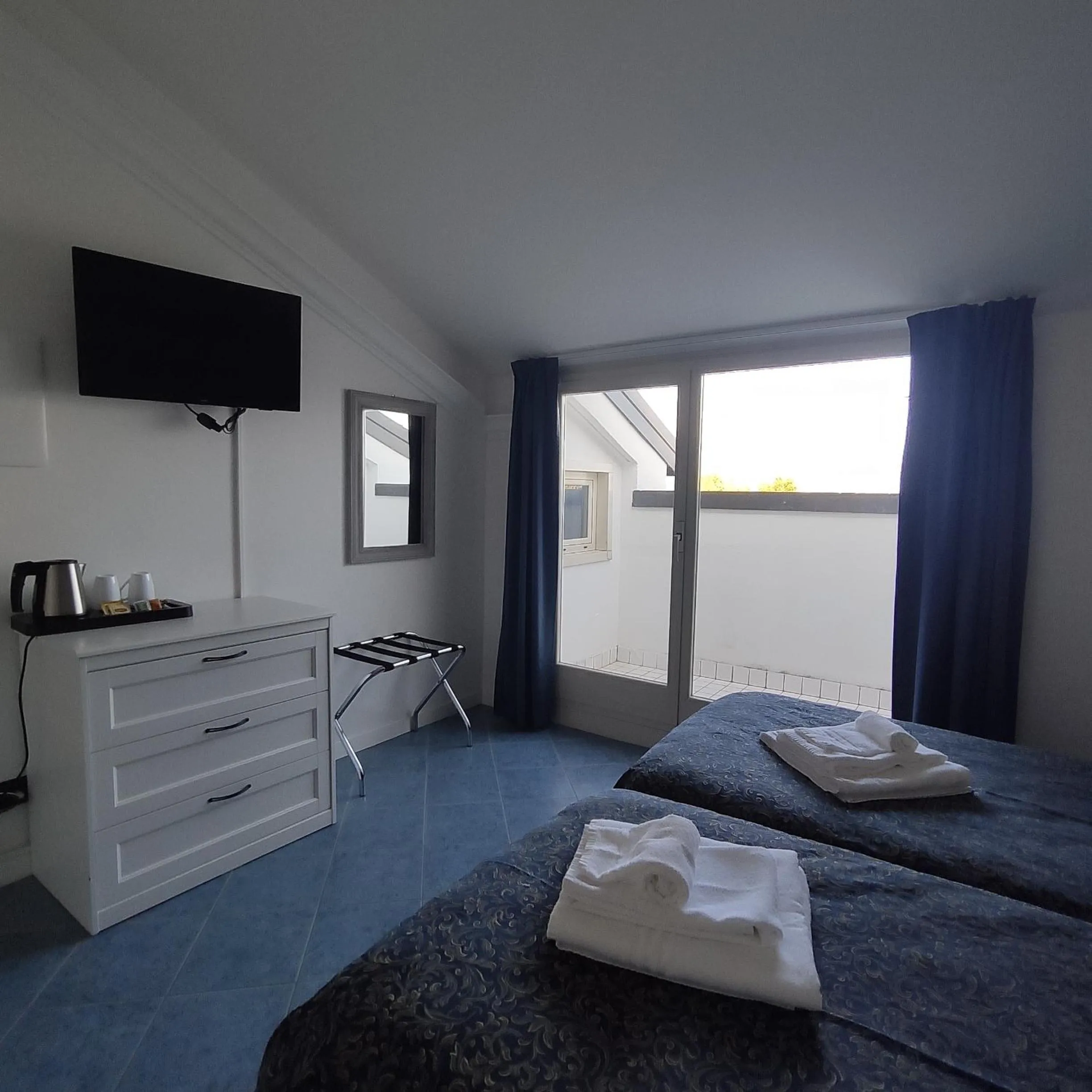 Bedroom in Hotel La Fontana
