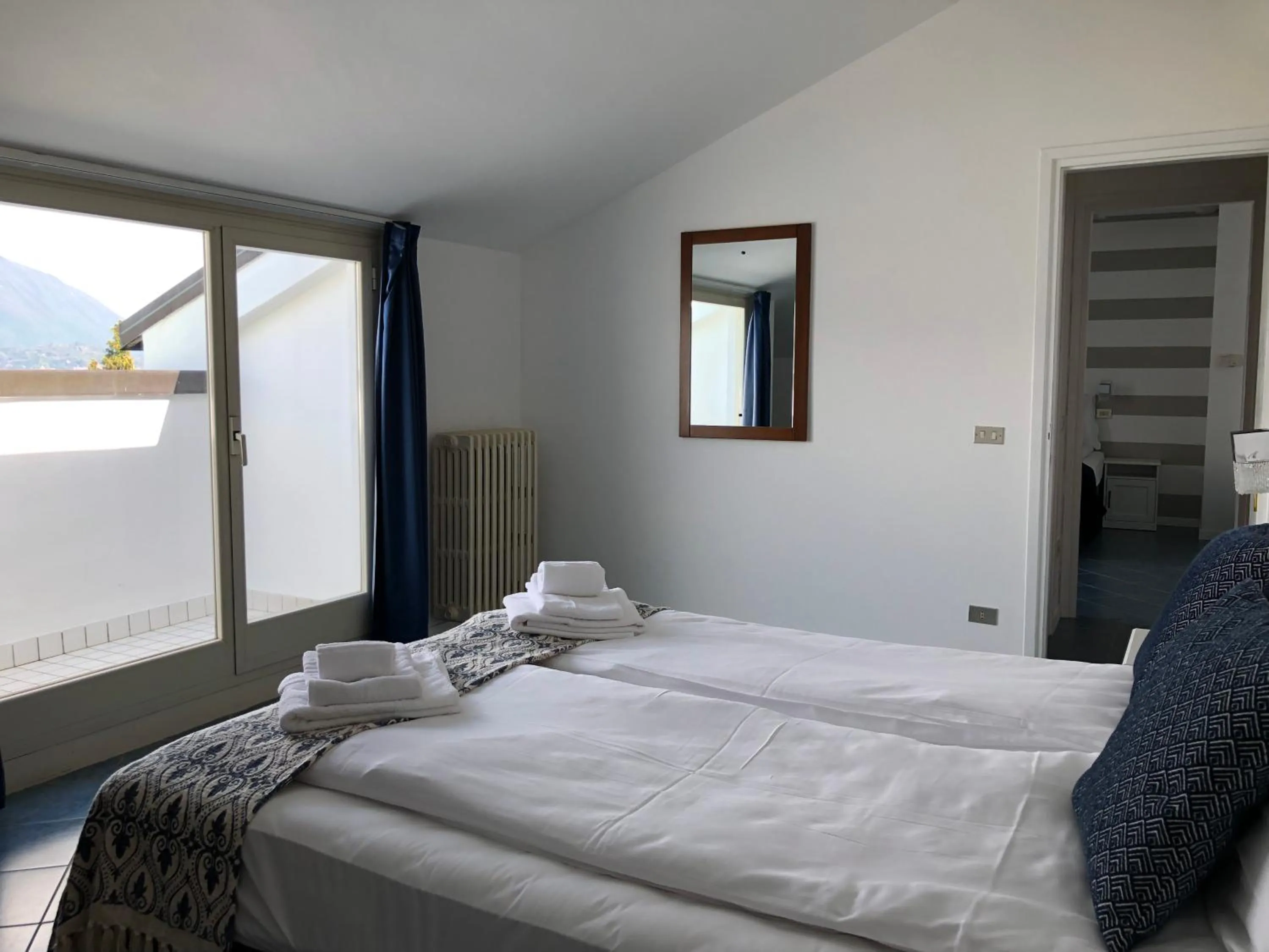 Bedroom in Hotel La Fontana