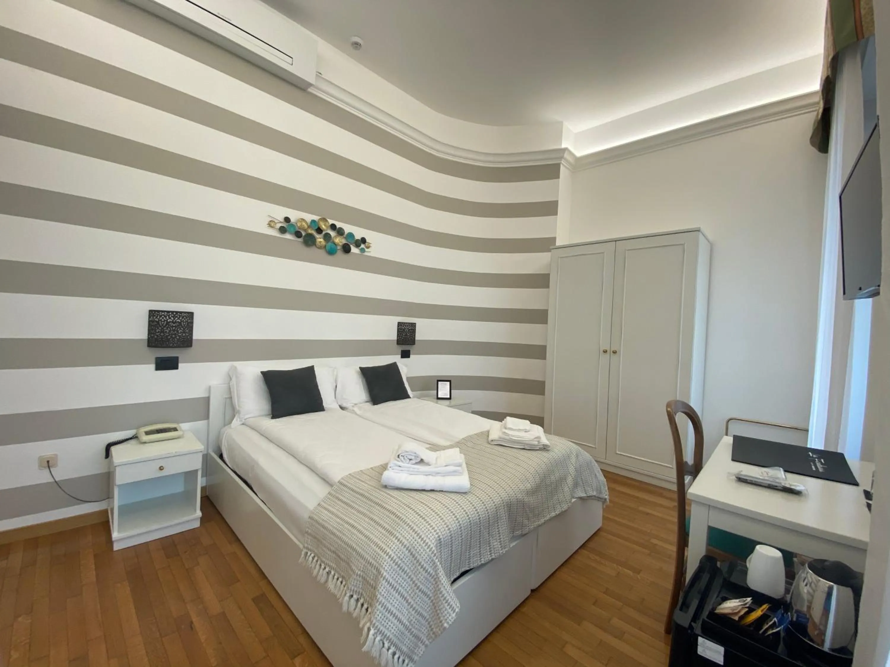 Bedroom in Hotel La Fontana