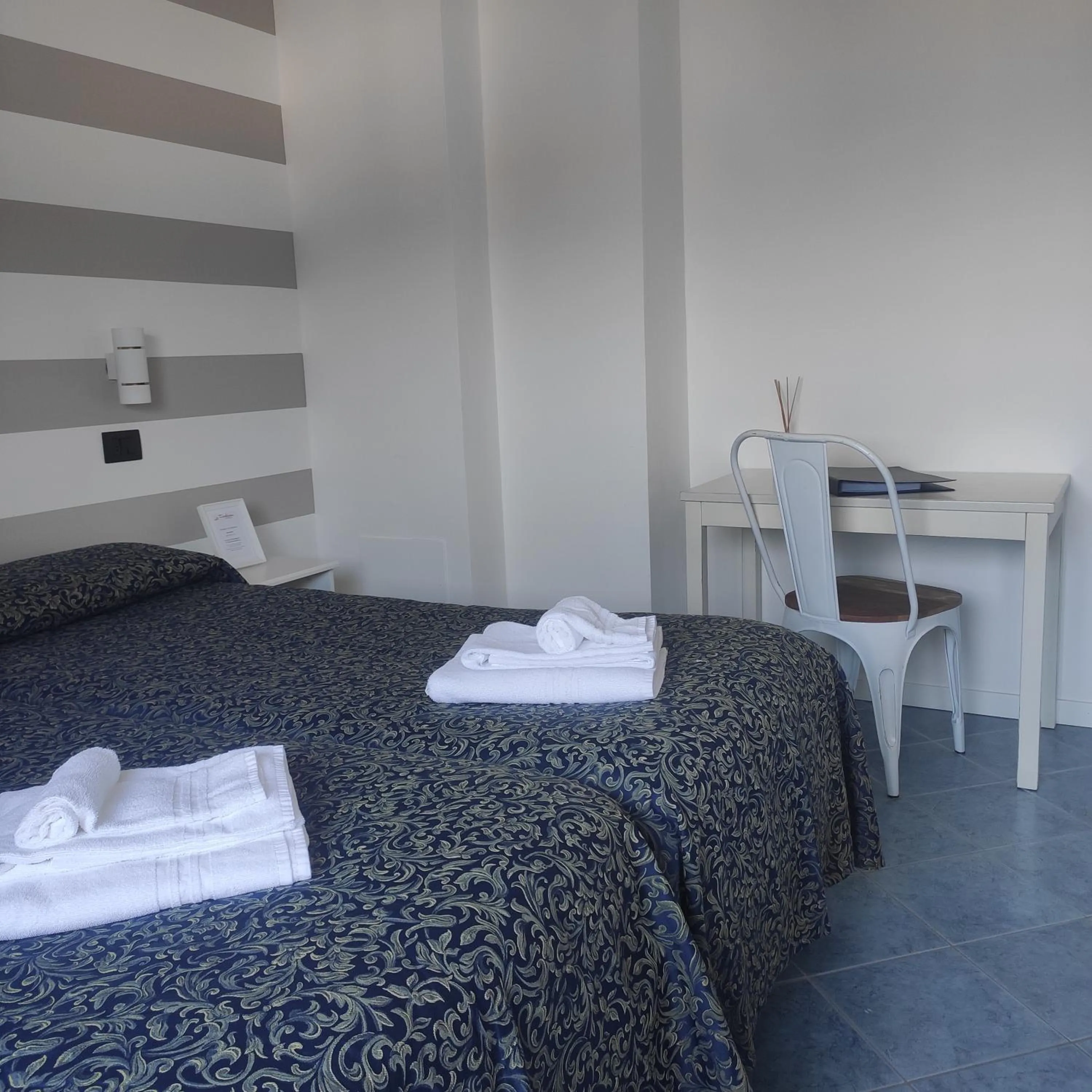 Bedroom in Hotel La Fontana