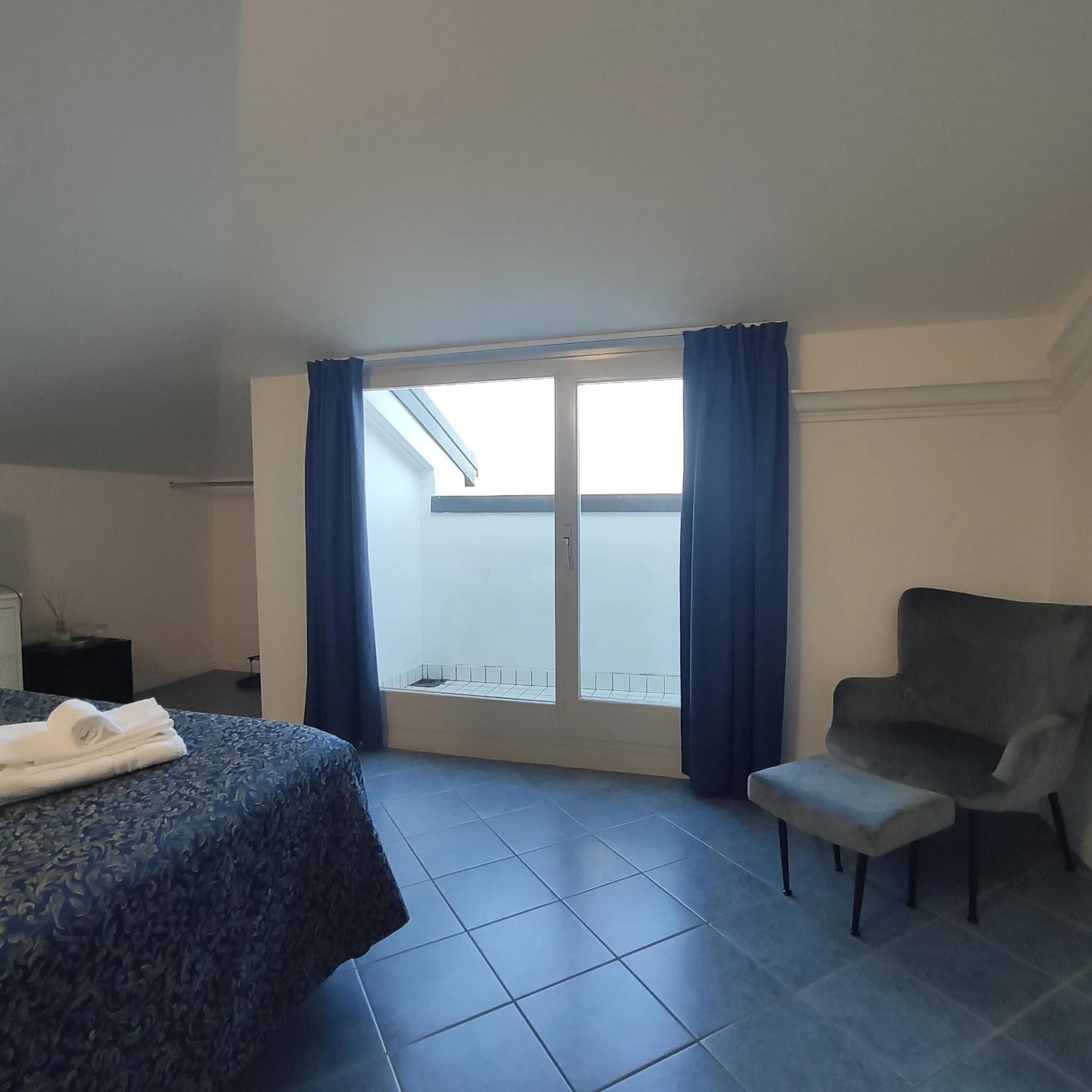 Bedroom in Hotel La Fontana