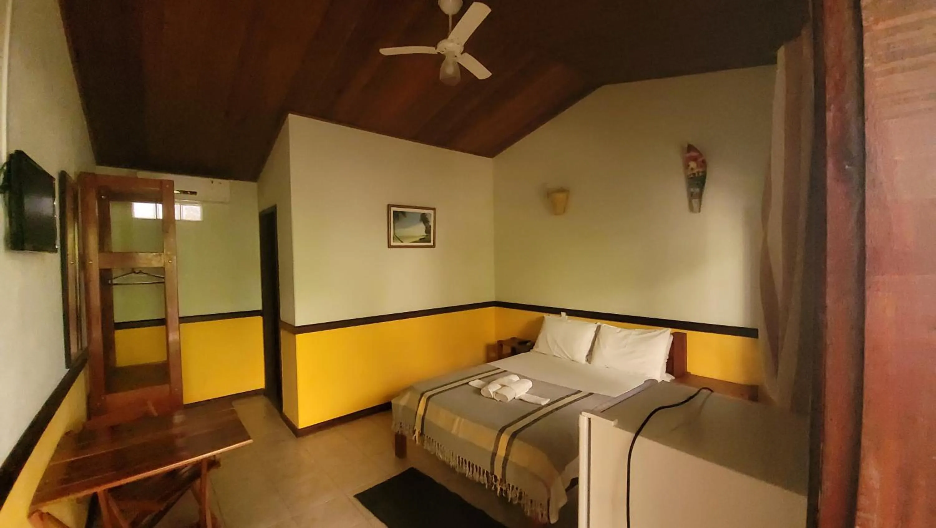 Photo of the whole room, Bed in Pousada Tropicalia