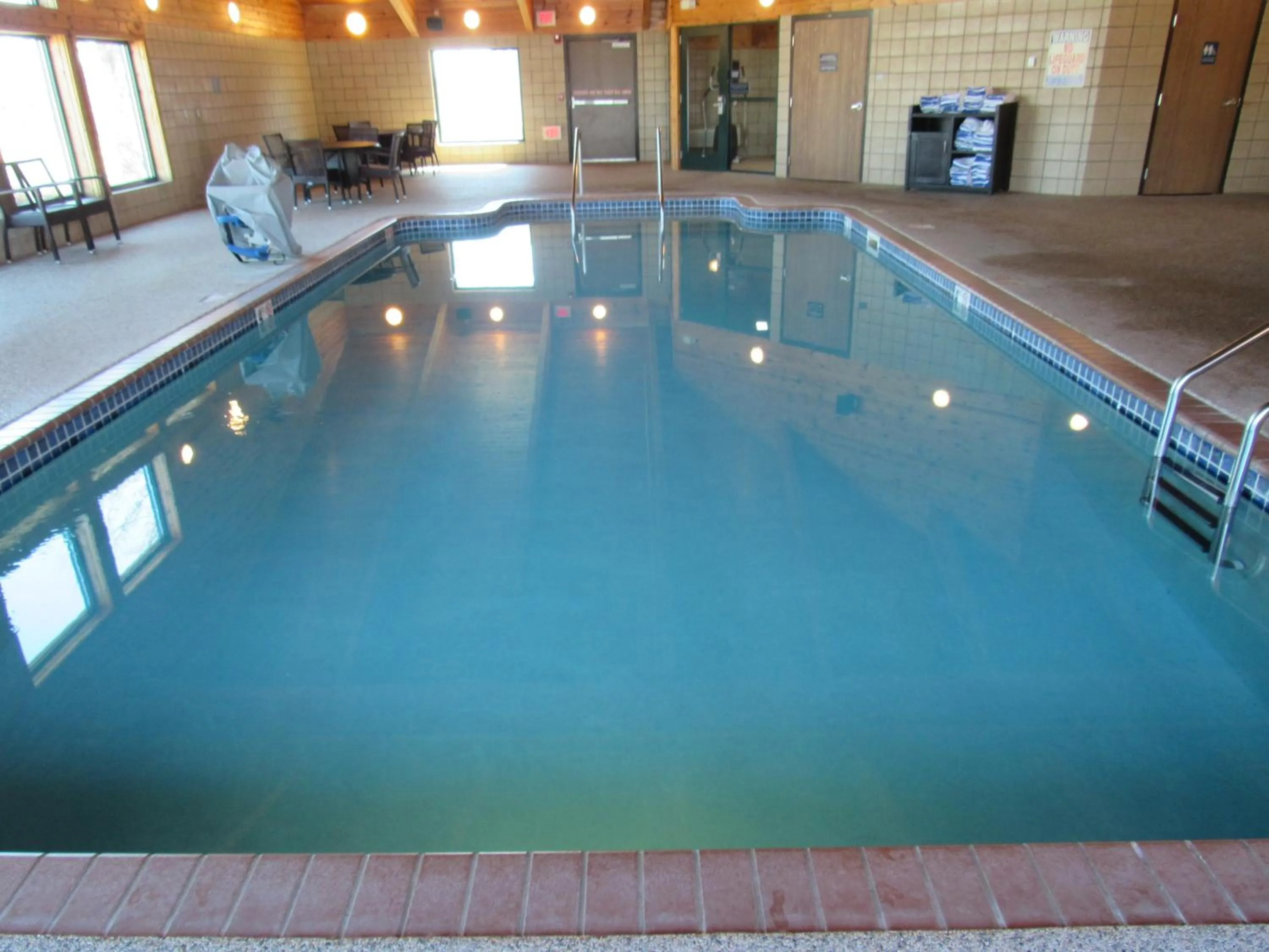 Swimming pool in AmericInn by Wyndham Lincoln South